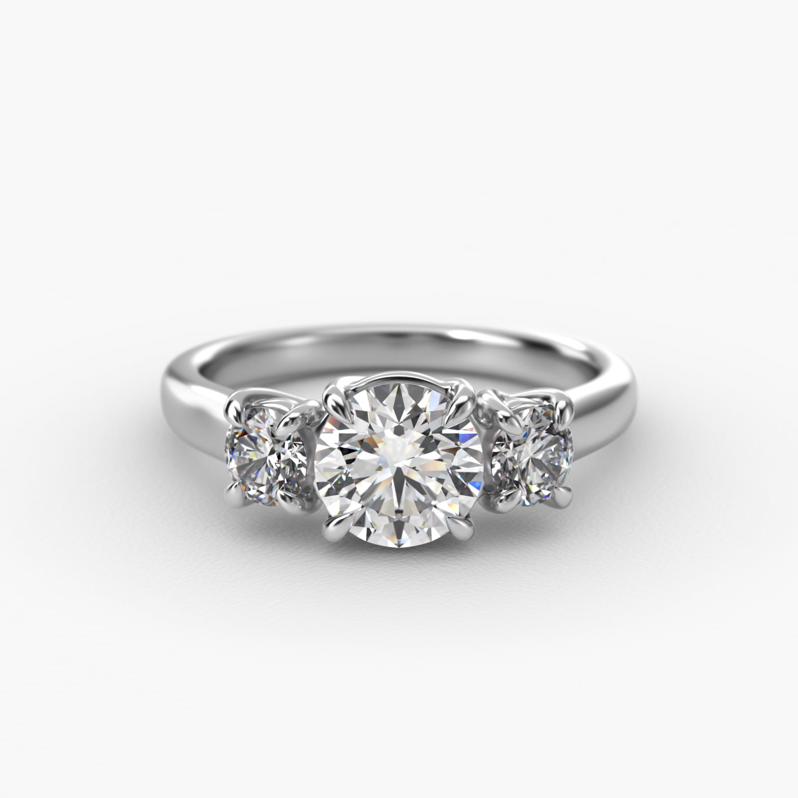 Round Diamond Three Stone Engagement Ring In Platinum