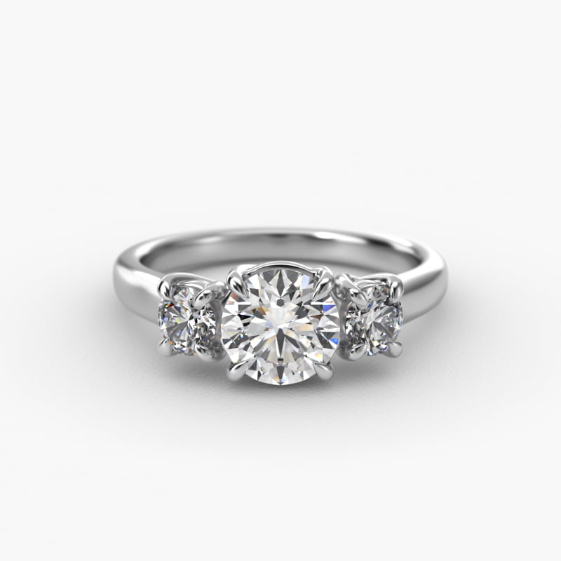 Round Diamond Three Stone Engagement Ring In Platinum