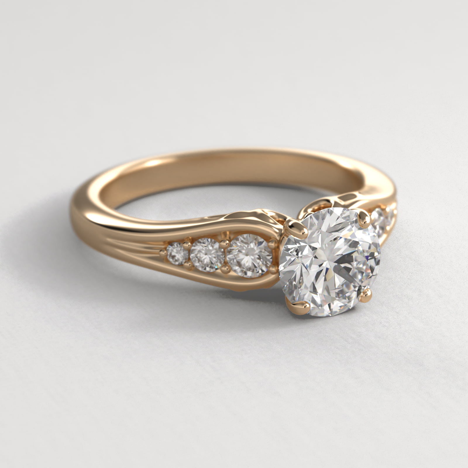 Graduated Pavé Swirl Side Stone Diamond Engagement Ring In 18K Yellow Gold