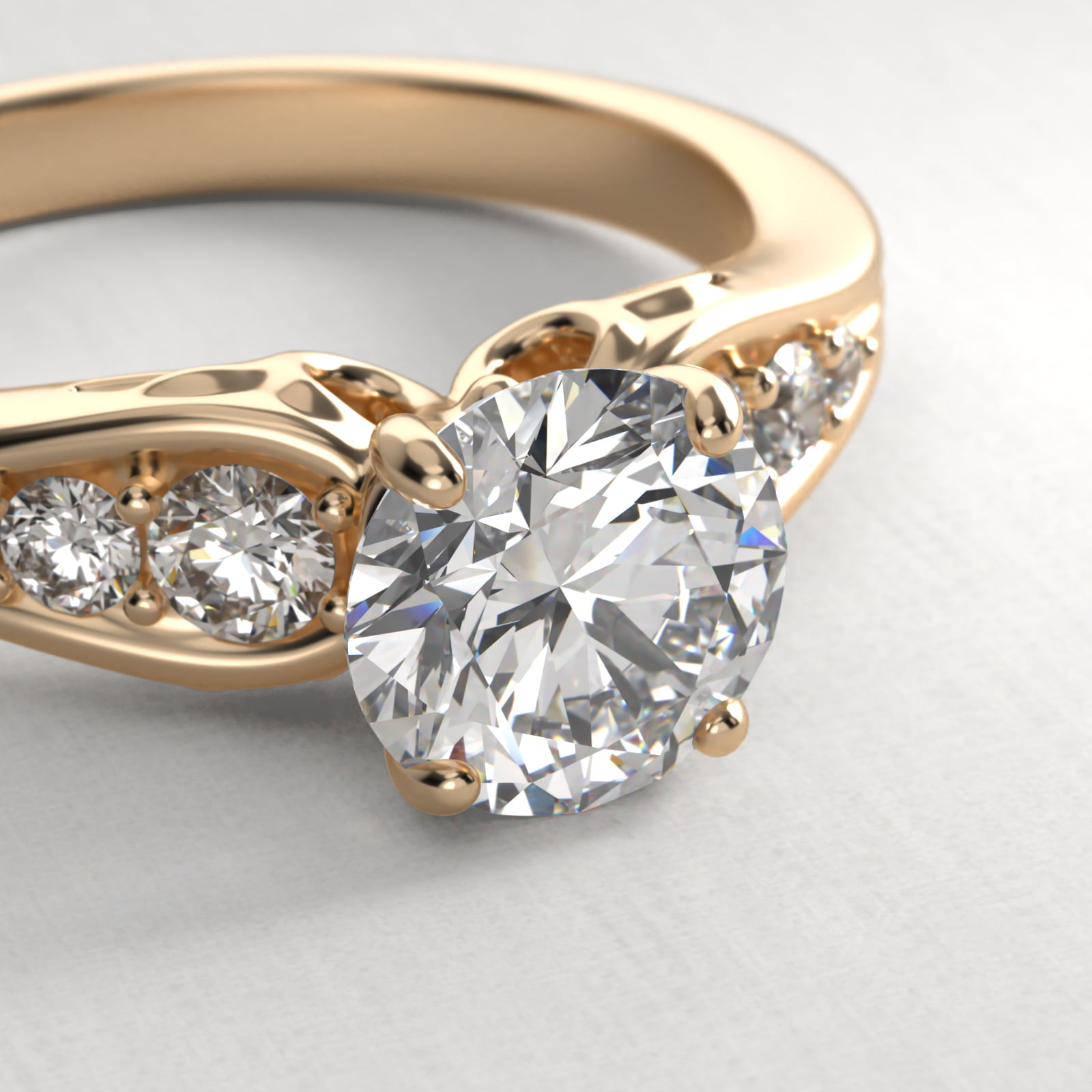 Graduated Pavé Swirl Side Stone Diamond Engagement Ring In 18K Yellow Gold