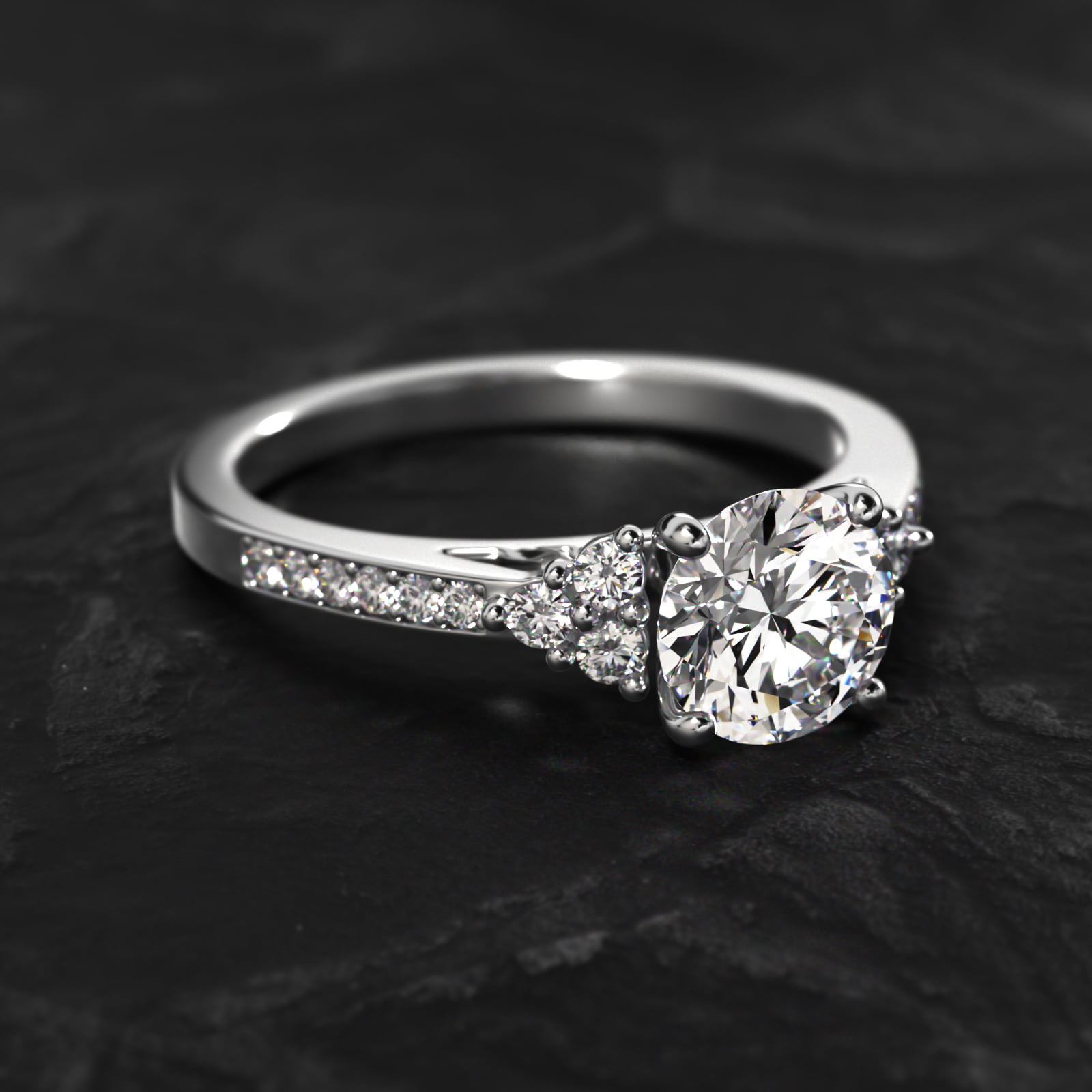 Pavé Trio Side Stone Diamond Engagement Ring In Platinum