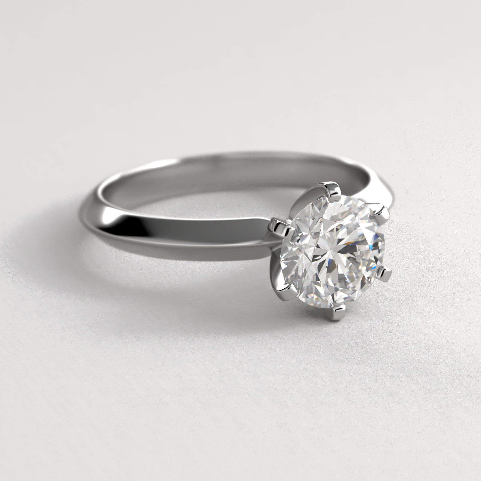 Knife Edge Six Prong Solitaire Engagement Ring In 18K White Gold