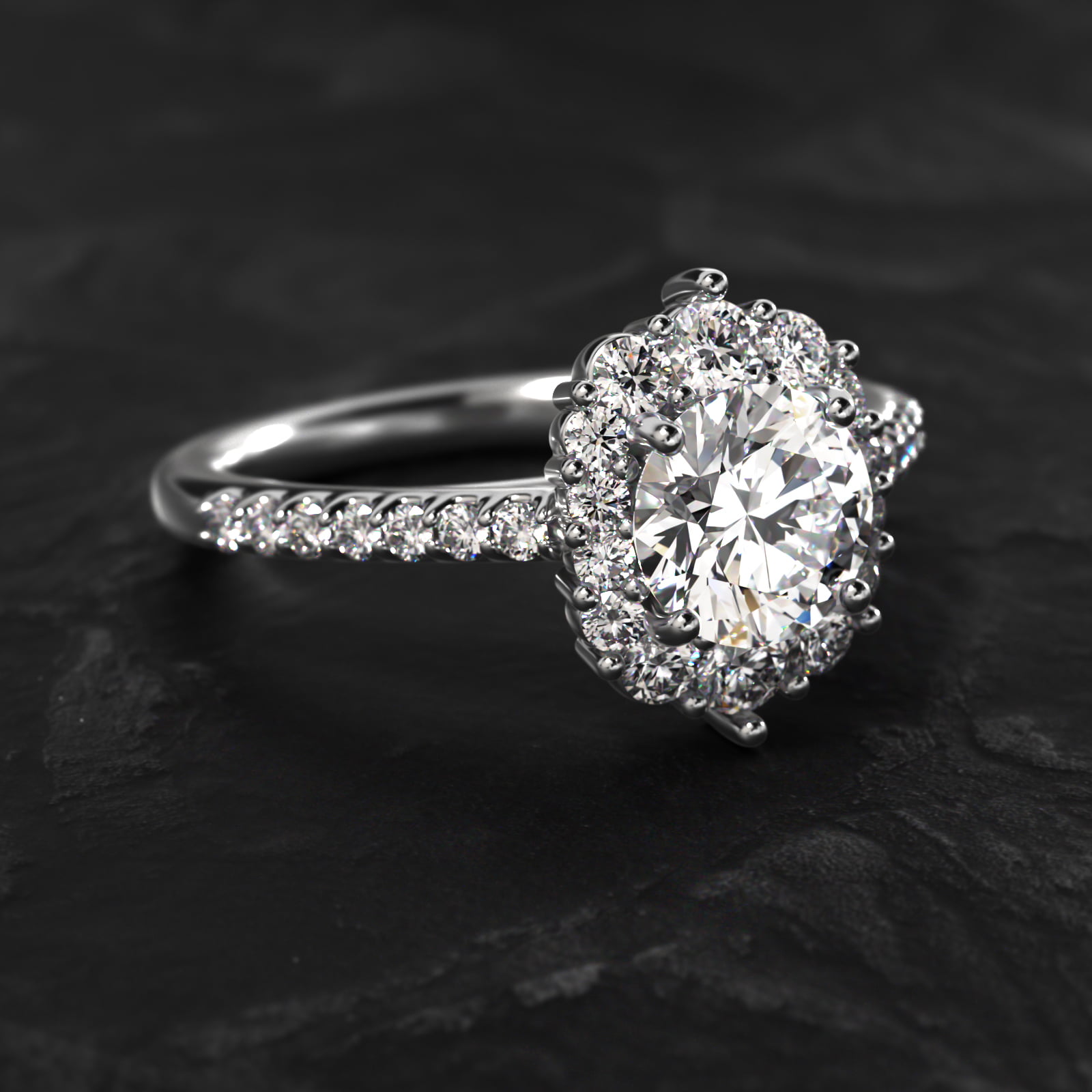 Graduated Diamond Halo Engagement Ring In Platinum