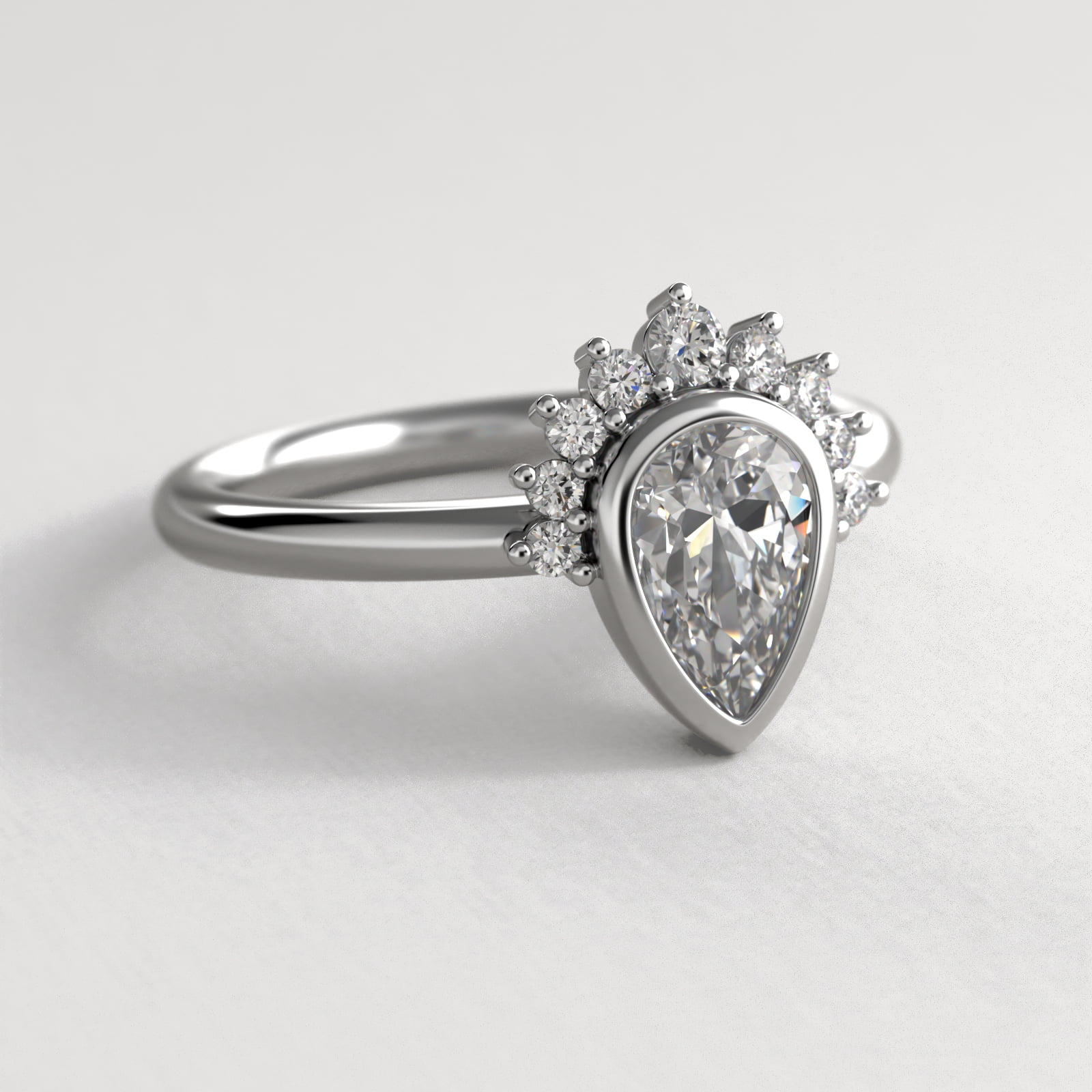 Pear Shape Bezel Set Diamond Tiara Engagement Ring In Platinum