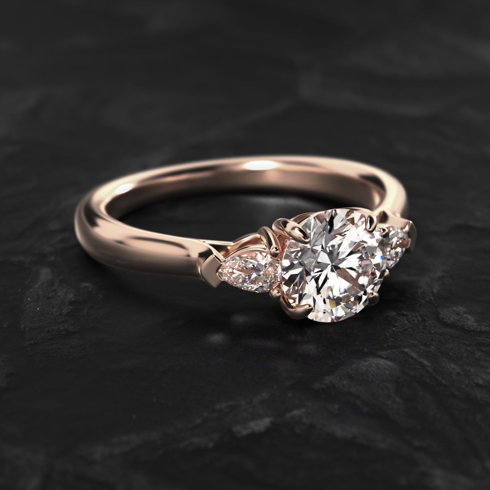 Pear Shaped Diamond Three Stone Engagement Ring In 14K Rose Gold