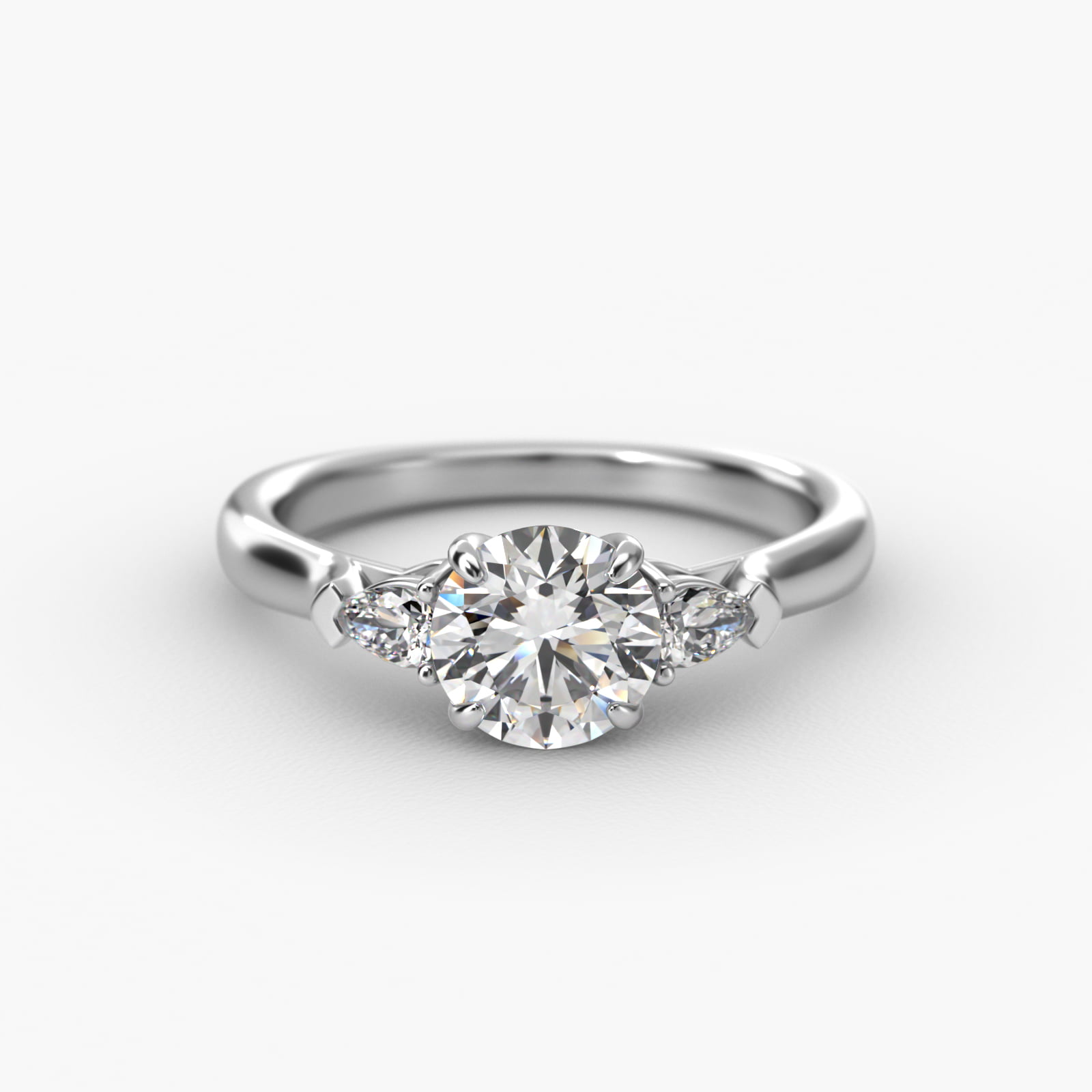 Pear Shaped Diamond Three Stone Engagement Ring In 14K White Gold