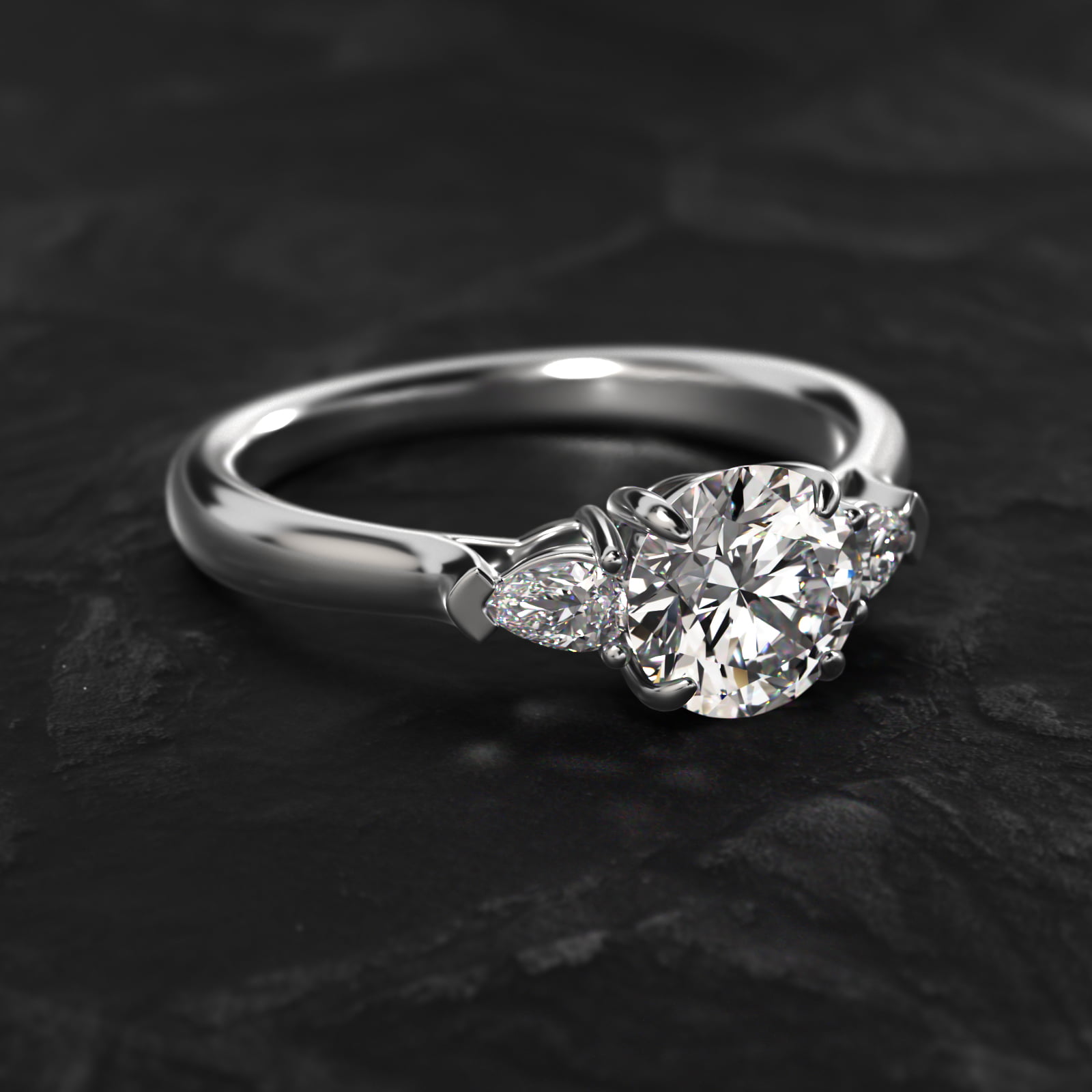 Pear Shaped Lab-Grown Diamond Three Stone Engagement Ring In Platinum
