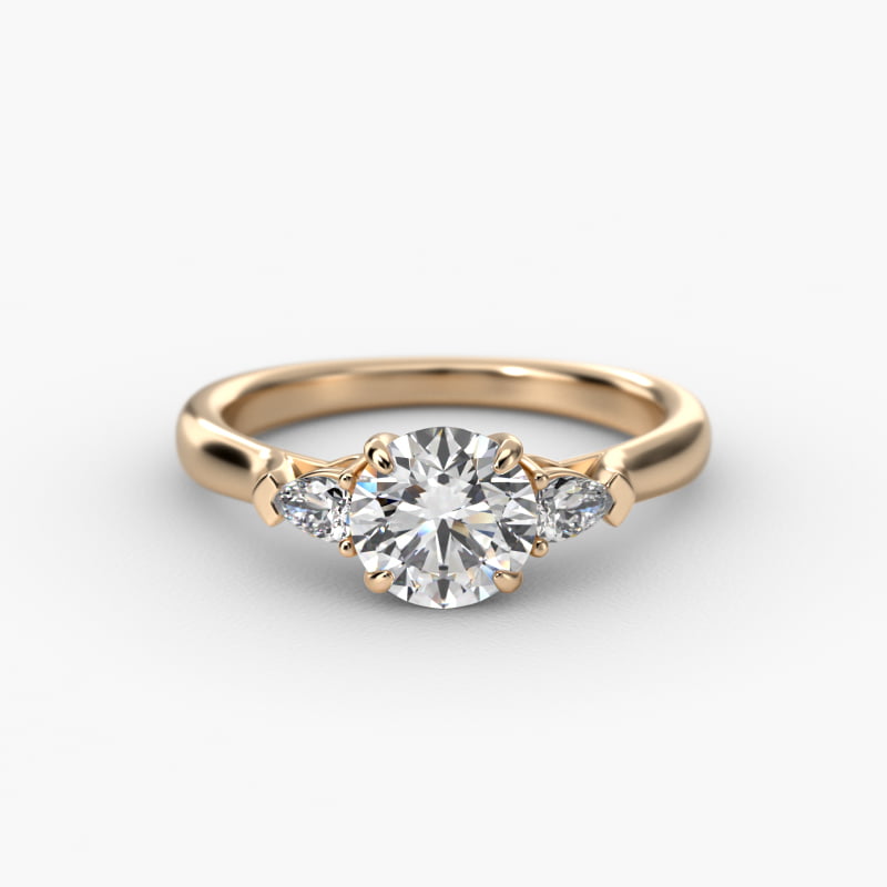 Pear Shaped Diamond Three Stone Engagement Ring In 14K Yellow Gold