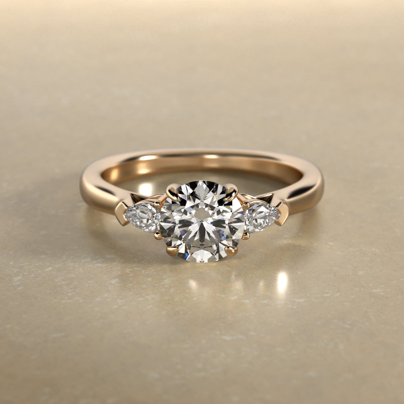 Pear Shaped Diamond Three Stone Engagement Ring In 14K Yellow Gold