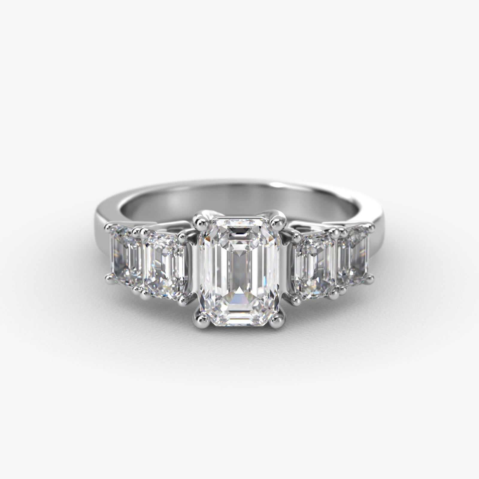 Four Emerald Cut Side Stone Diamond Engagement Ring In 14K White Gold