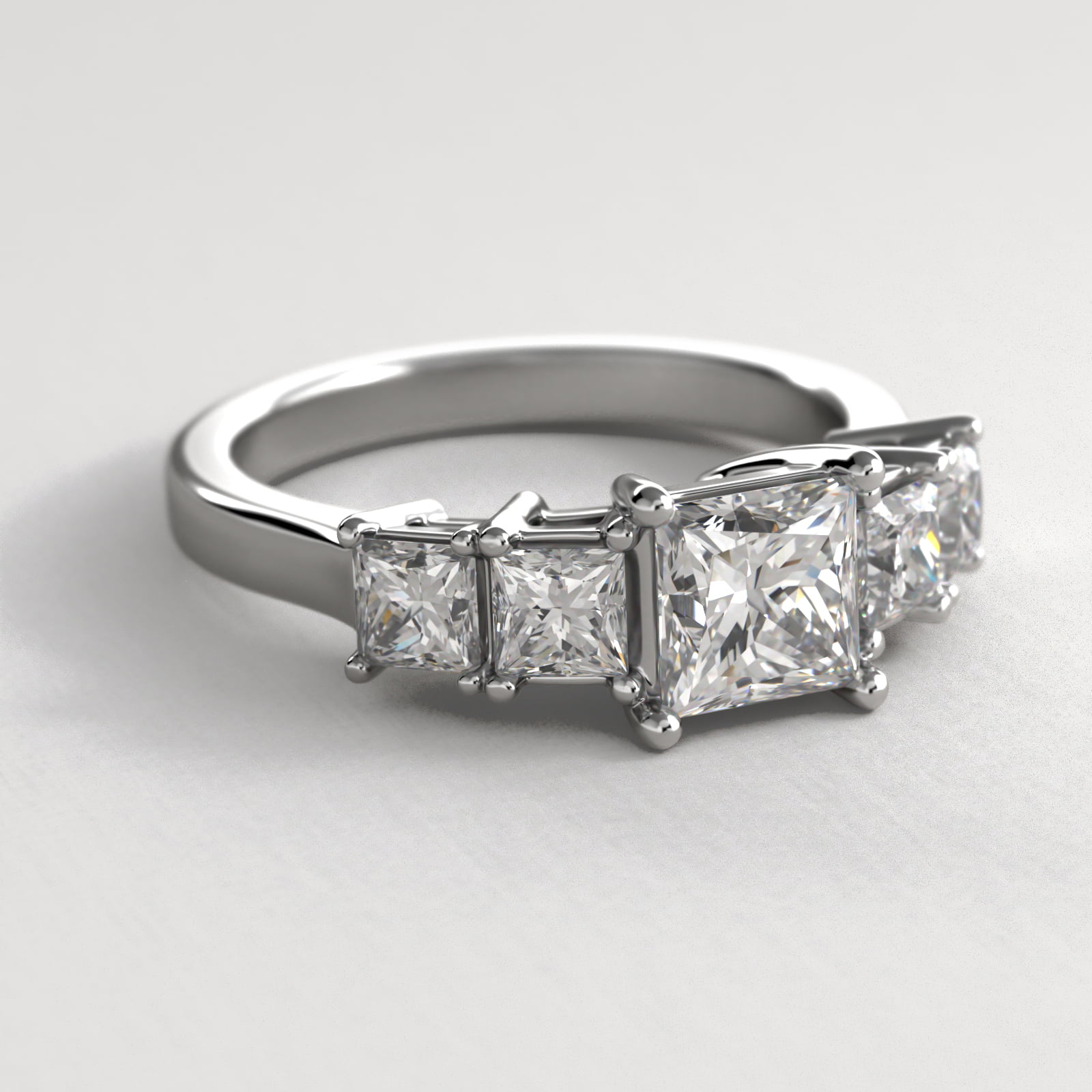 Four Princess Cut Side Stone Diamond Engagement Ring In Platinum