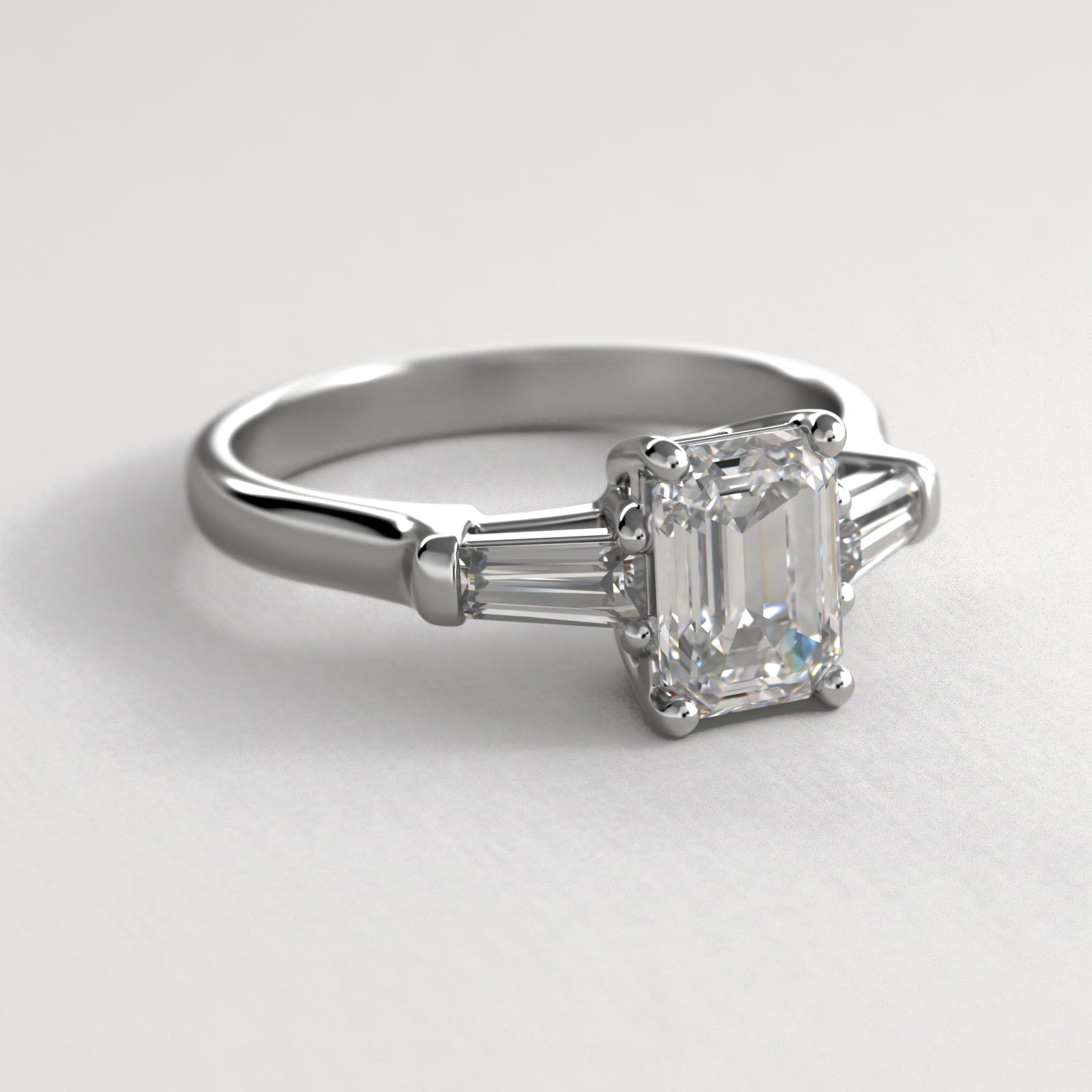 Tapered Baguette Cut Diamond Three Stone Engagement Ring In 18K White Gold