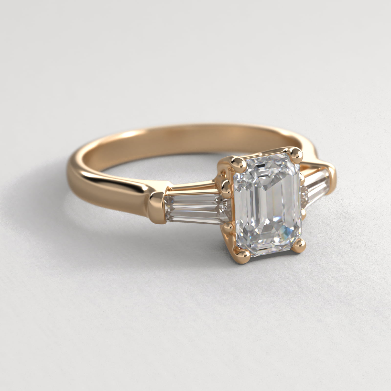 Tapered Baguette Cut Diamond Three Stone Engagement Ring In 14K Yellow Gold