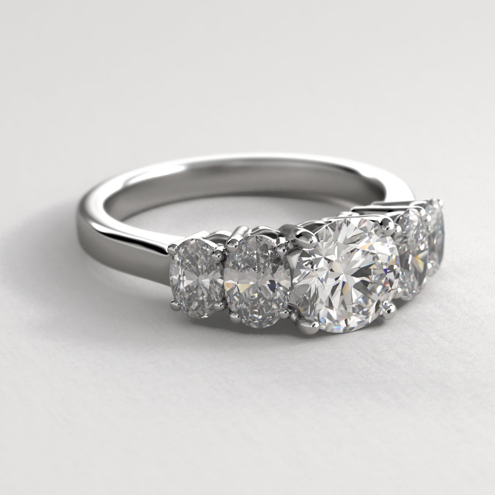 Four Oval Cut Side Stone Diamond Engagement Ring In 14K White Gold