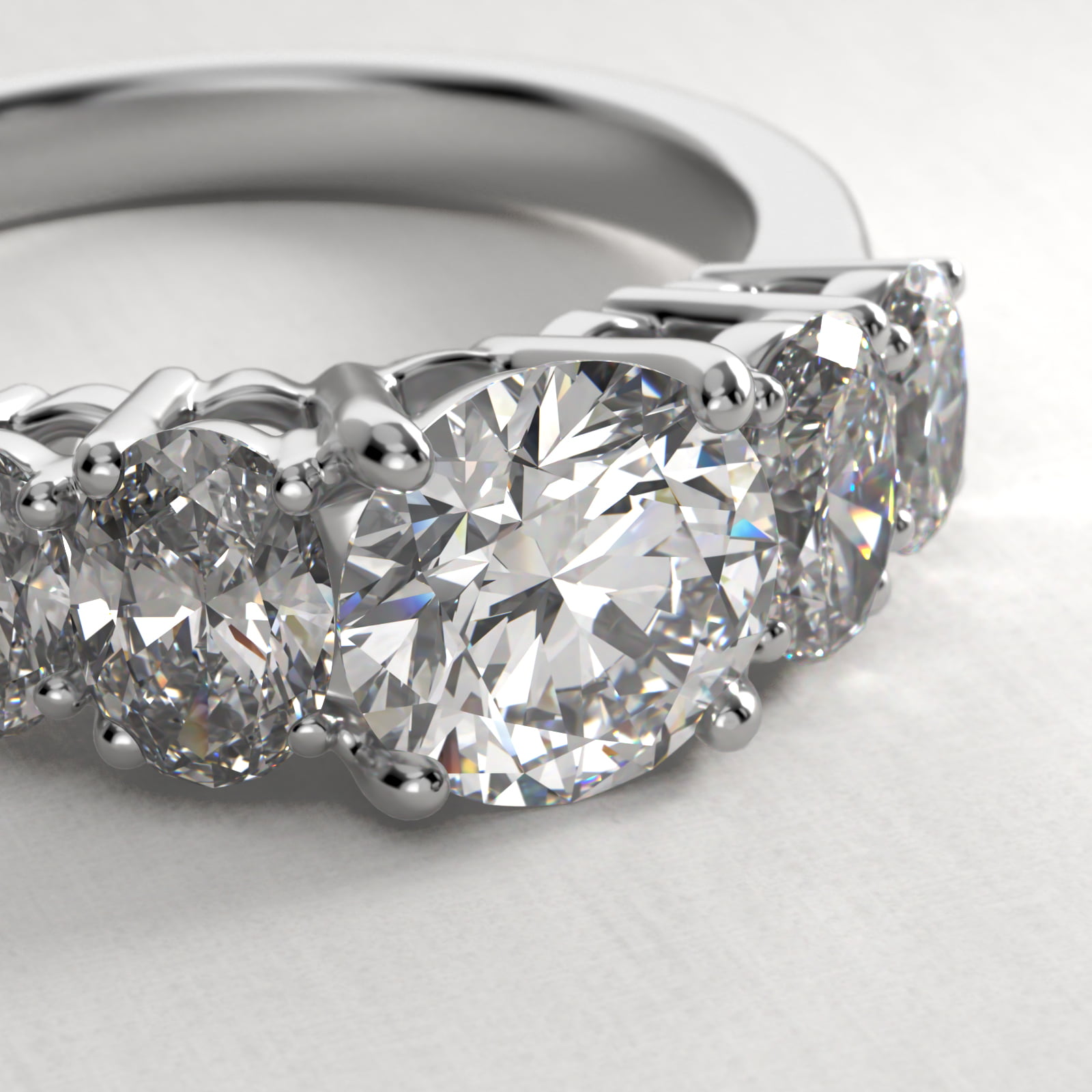 Four Oval Cut Side Stone Diamond Engagement Ring In 14K White Gold