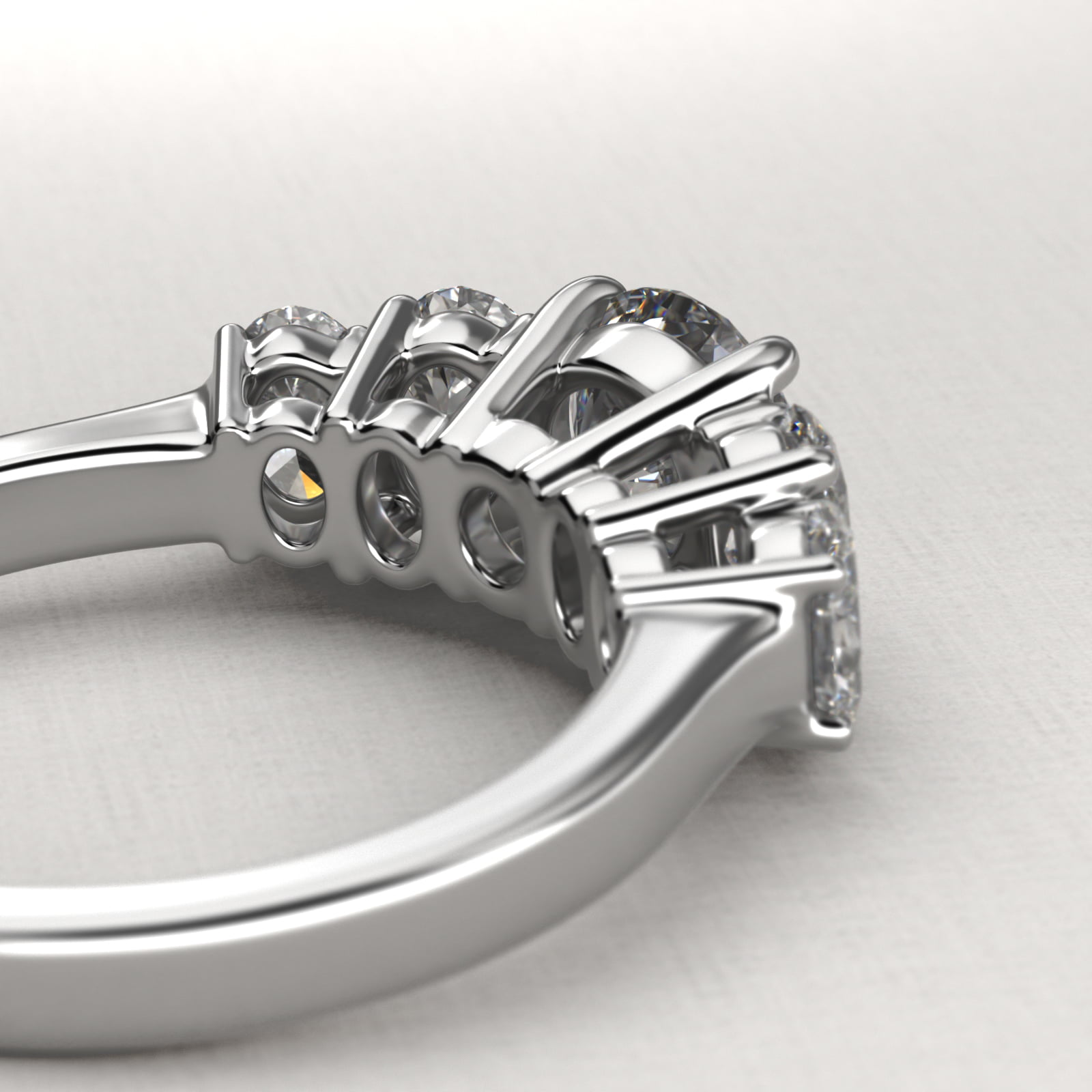 Four Oval Cut Side Stone Diamond Engagement Ring In Platinum