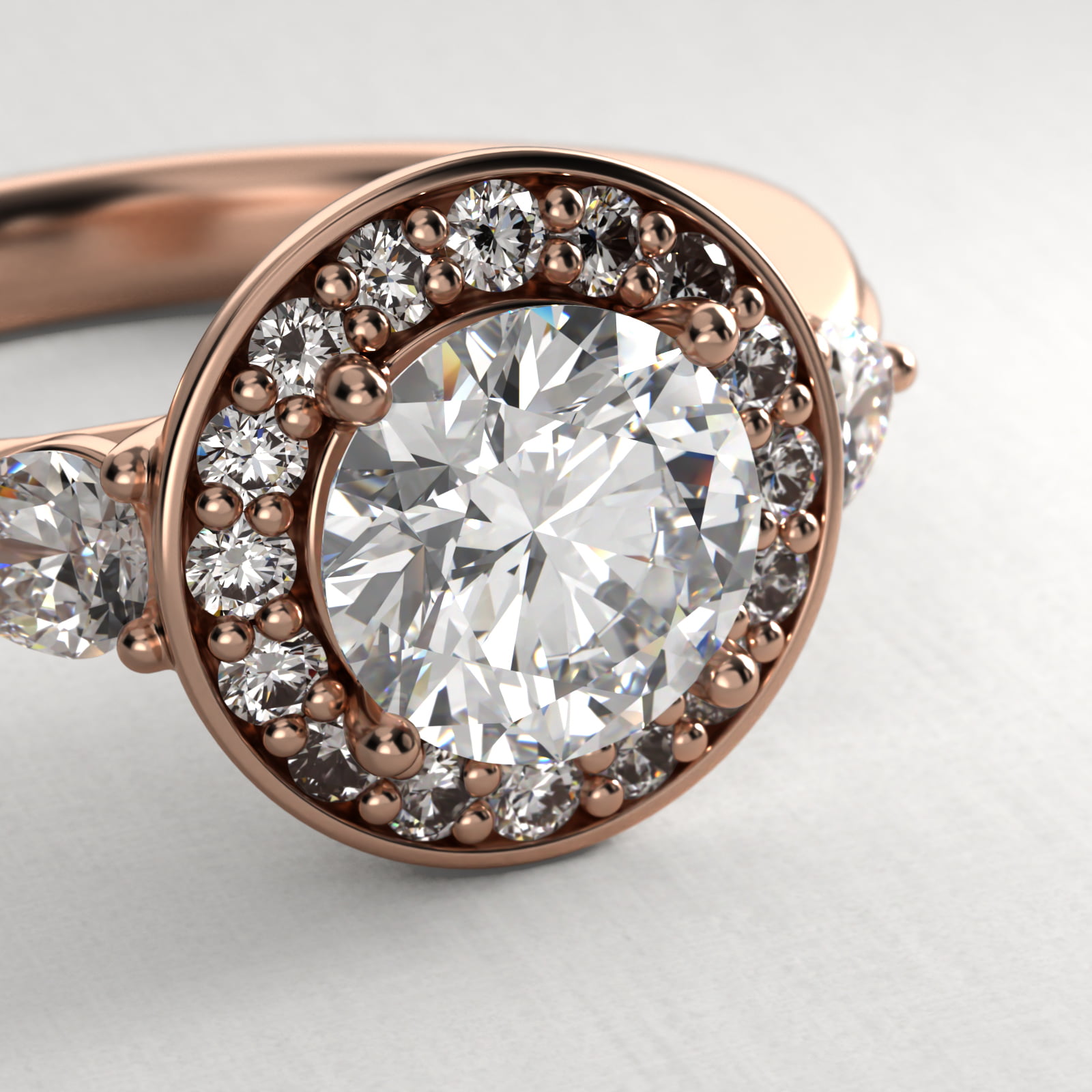 Pear Shape Side Stone Diamond Halo Engagement Ring In 14K Rose Gold
