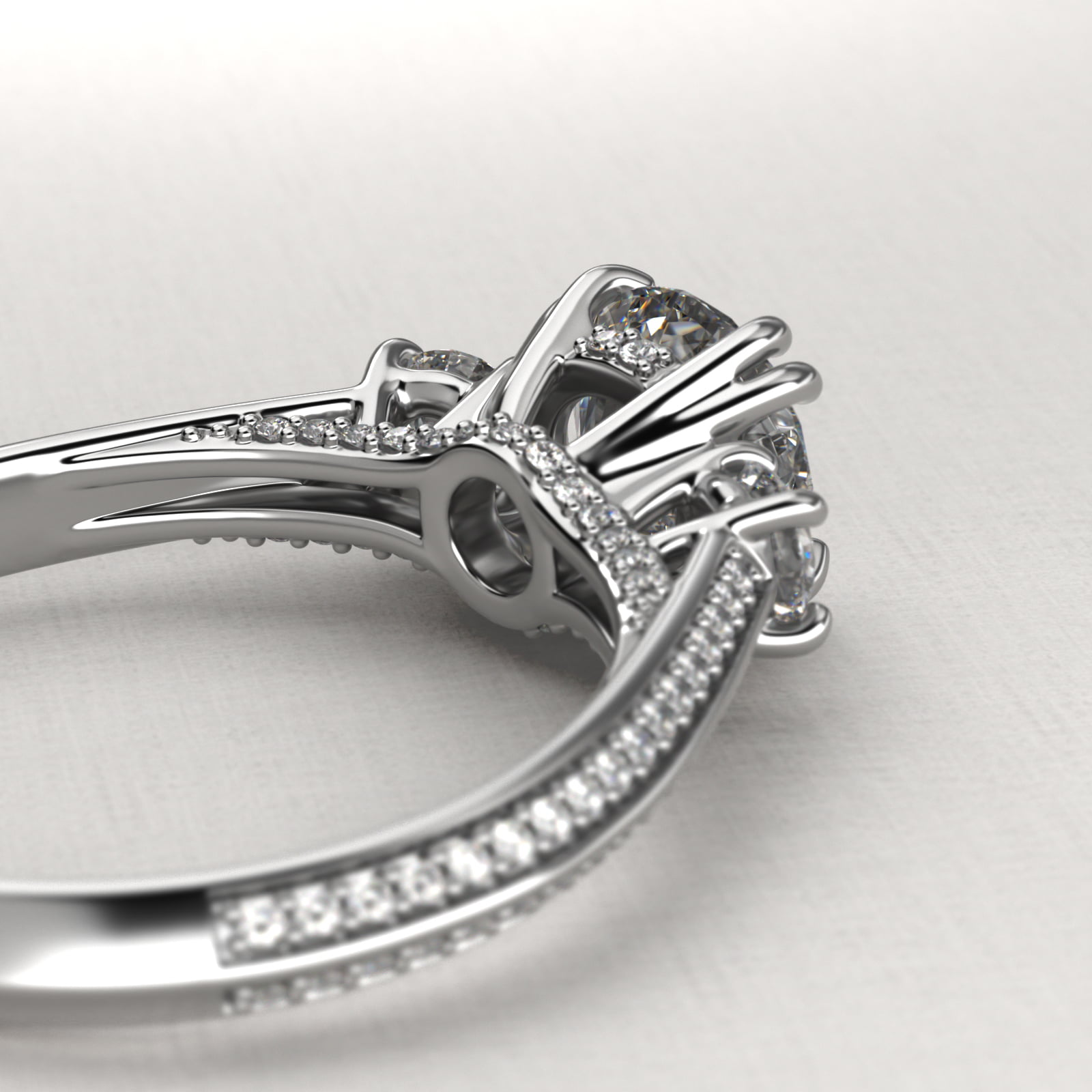 Pavé Knife Edge Diamond Three Stone Engagement Ring In Platinum