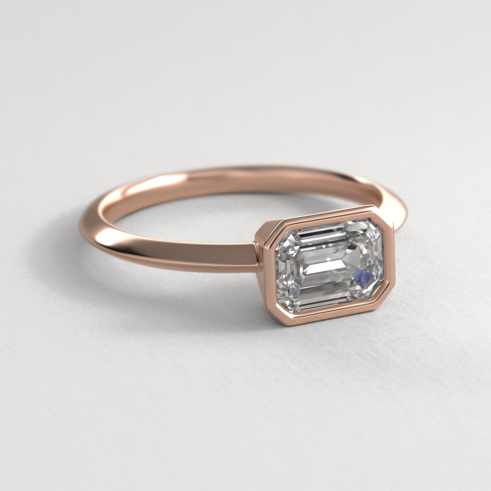 East West Knife Edge Bezel Solitaire Engagement Ring In 14K Rose Gold