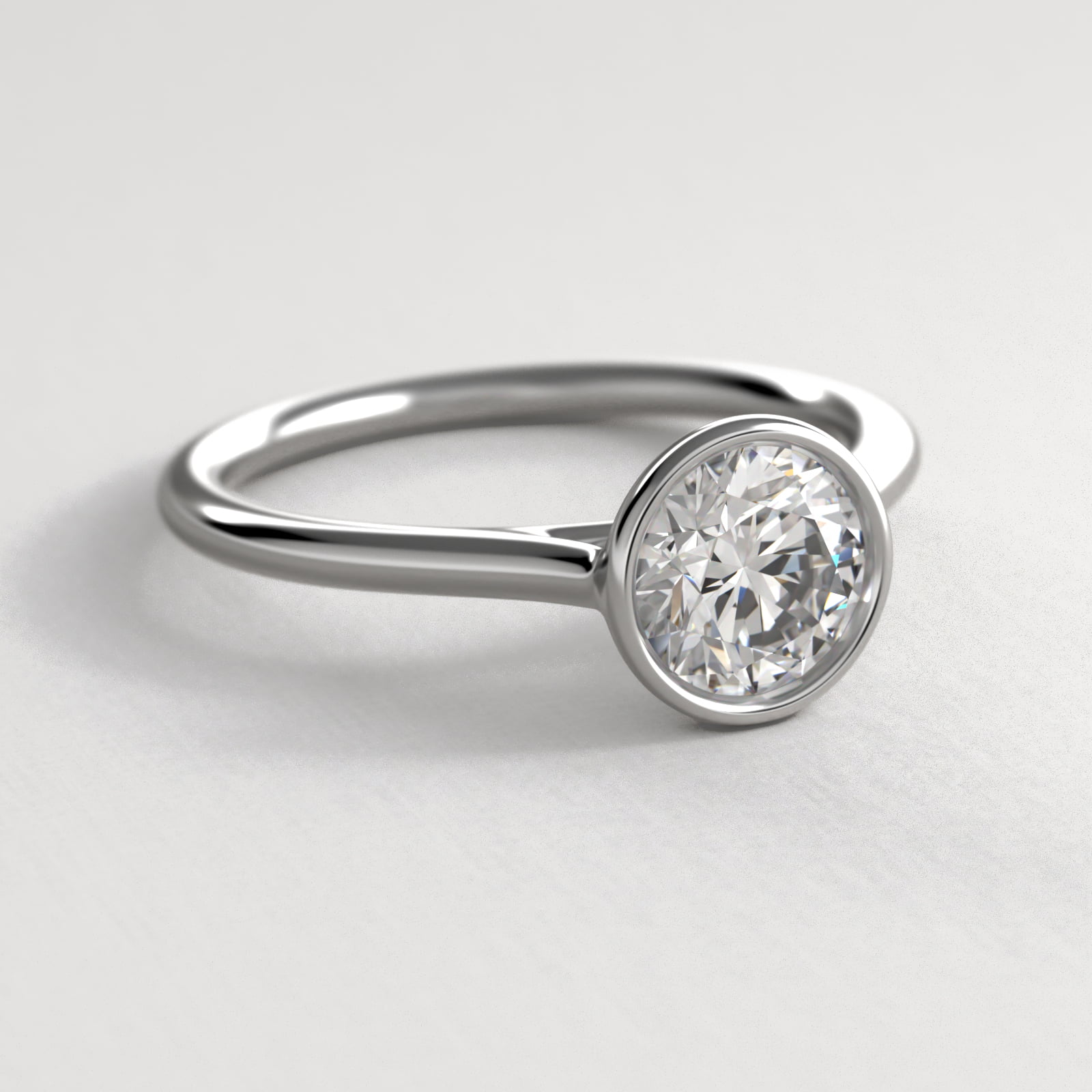 Comfort Fit Bezel Set Solitaire Engagement Ring In 14K White Gold