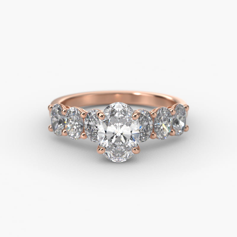 Oval Cut Side Stone Diamond Engagement Ring In 14K Rose Gold