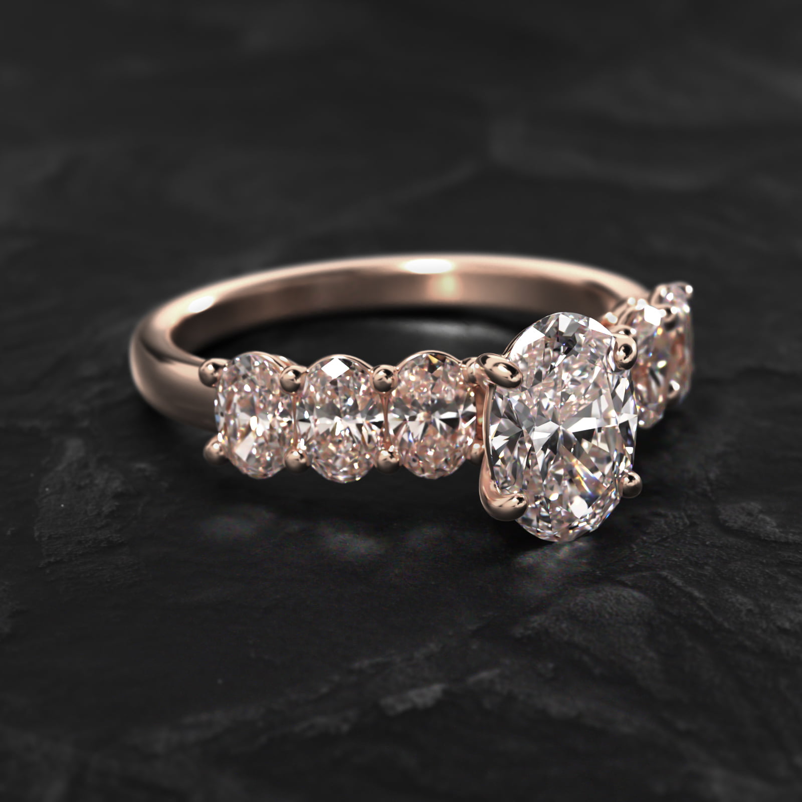 Oval Cut Side Stone Diamond Engagement Ring In 14K Rose Gold