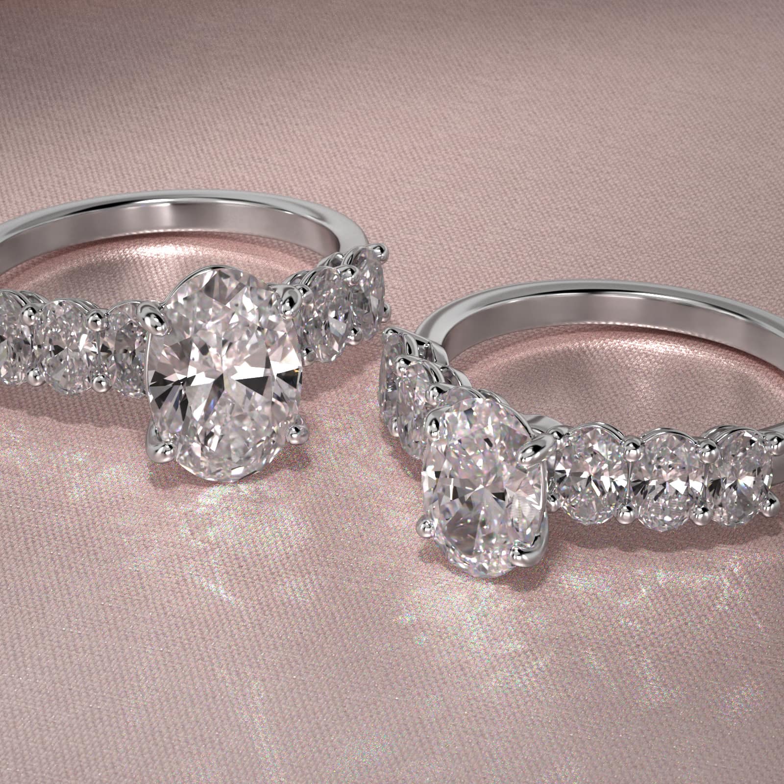 Oval Cut Side Stone Diamond Engagement Ring In 14K White Gold