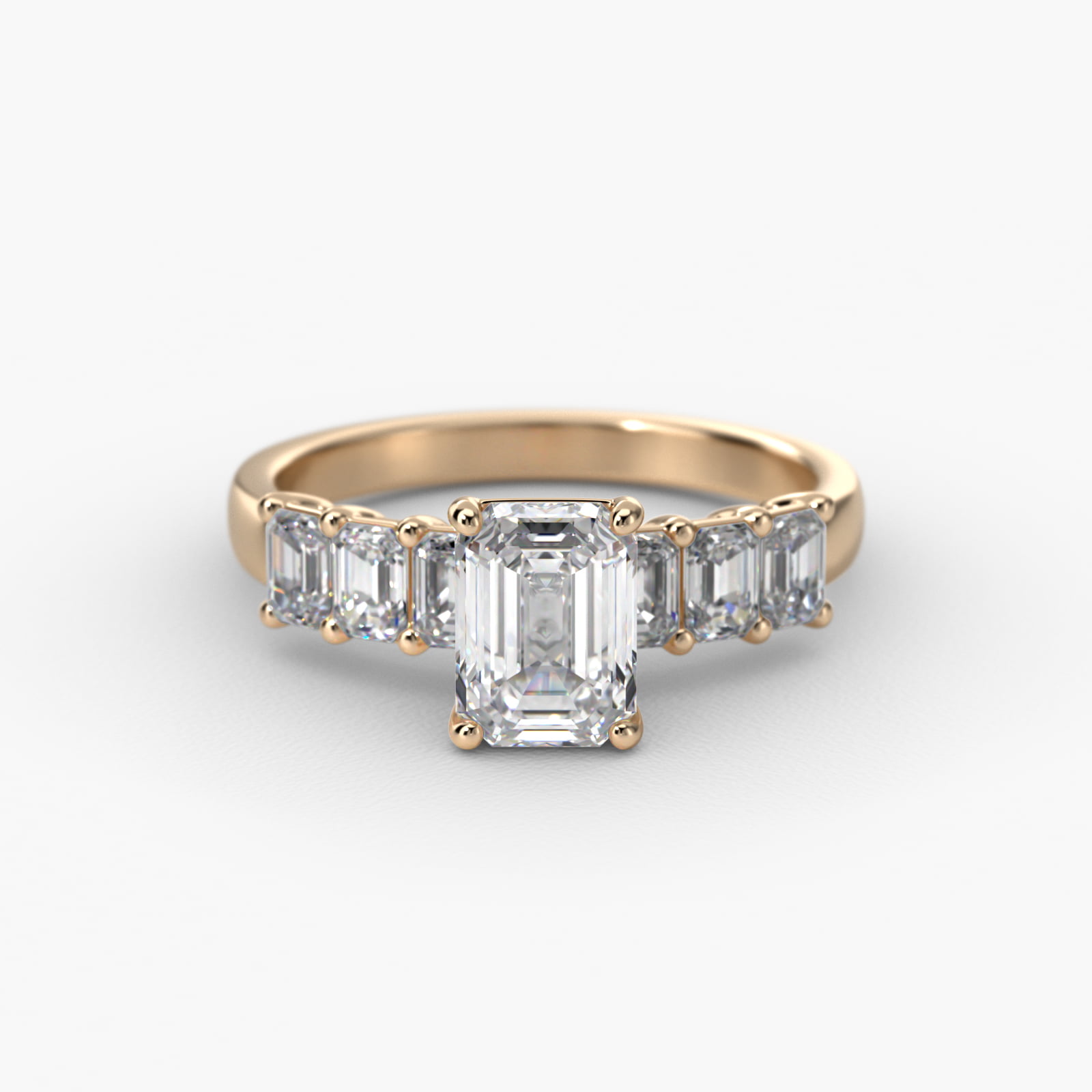 Emerald Cut Side Stone Diamond Engagement Ring In 18K Yellow Gold
