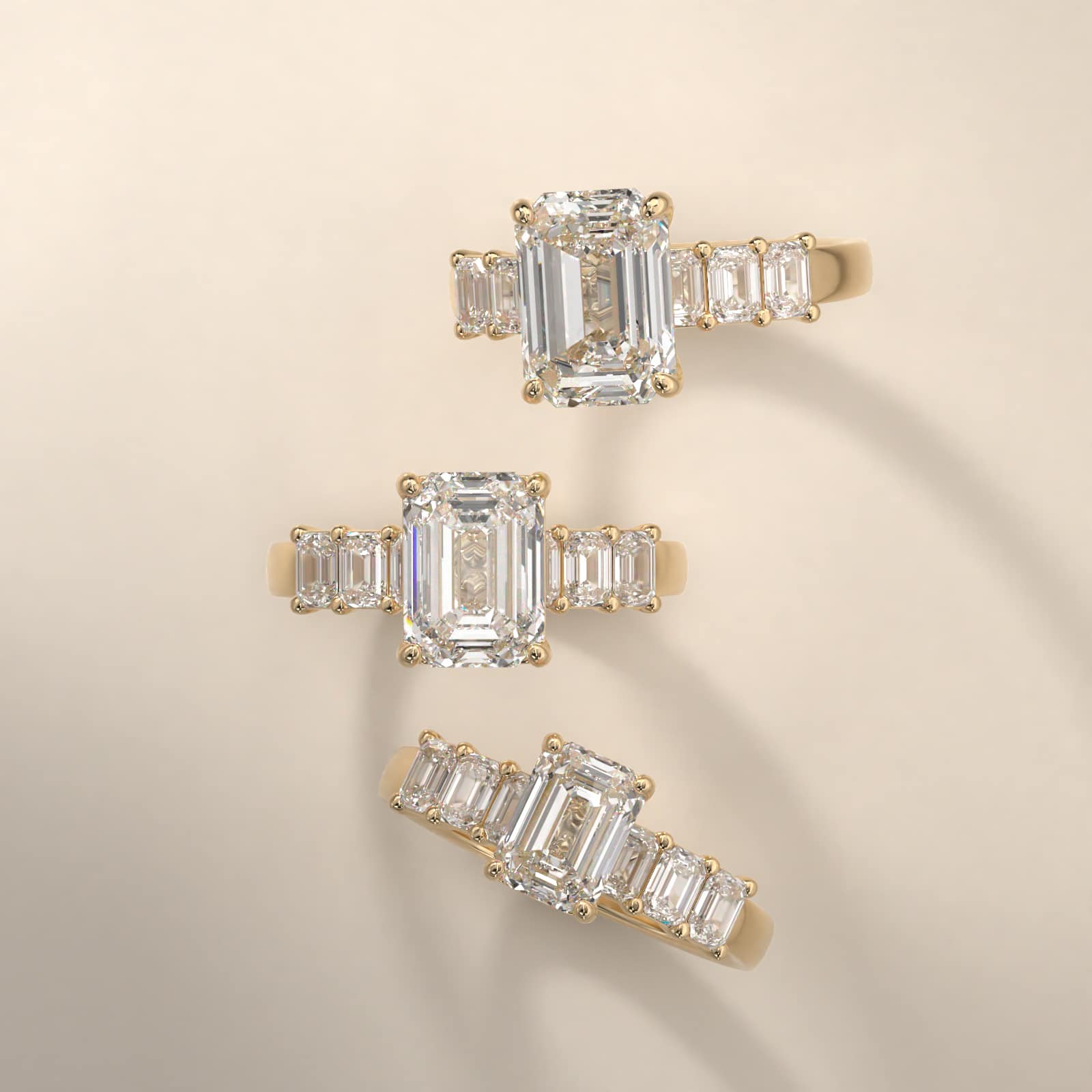 Emerald Cut Side Stone Diamond Engagement Ring In 18K Yellow Gold