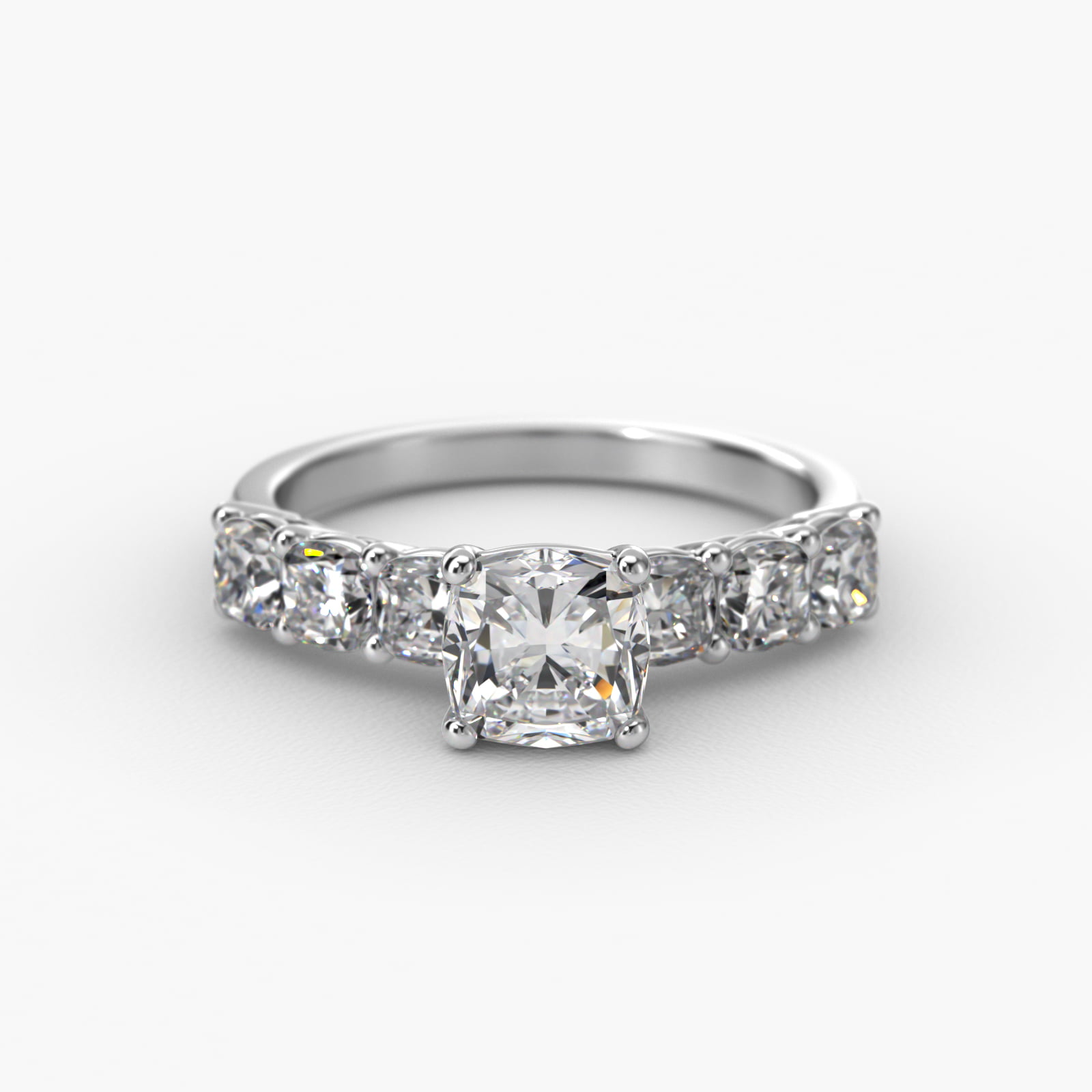 Cushion Cut Side Stone Diamond Engagement Ring In Platinum