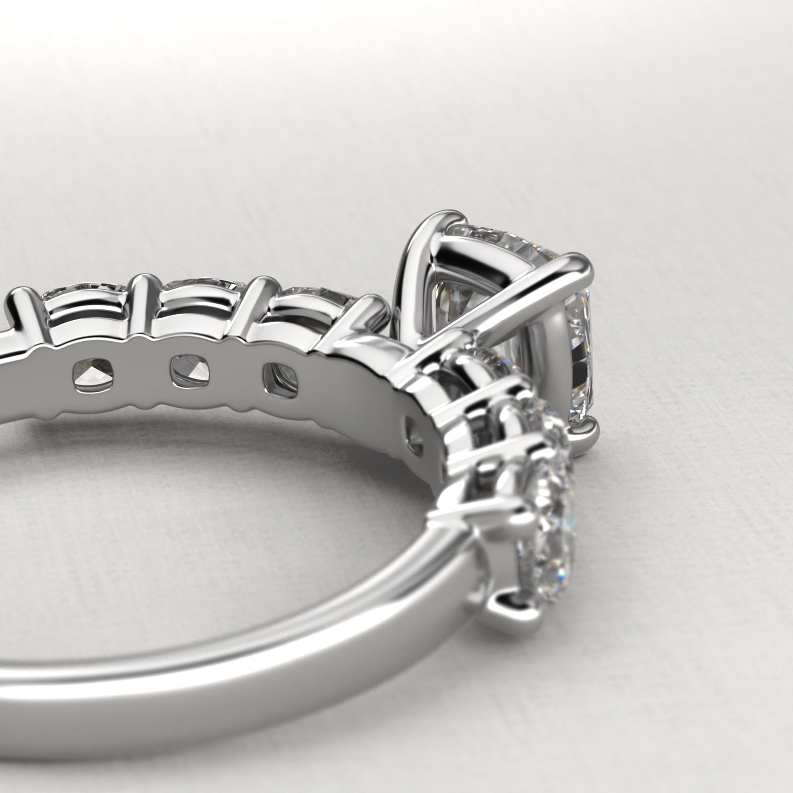 Cushion Cut Side Stone Diamond Engagement Ring In Platinum