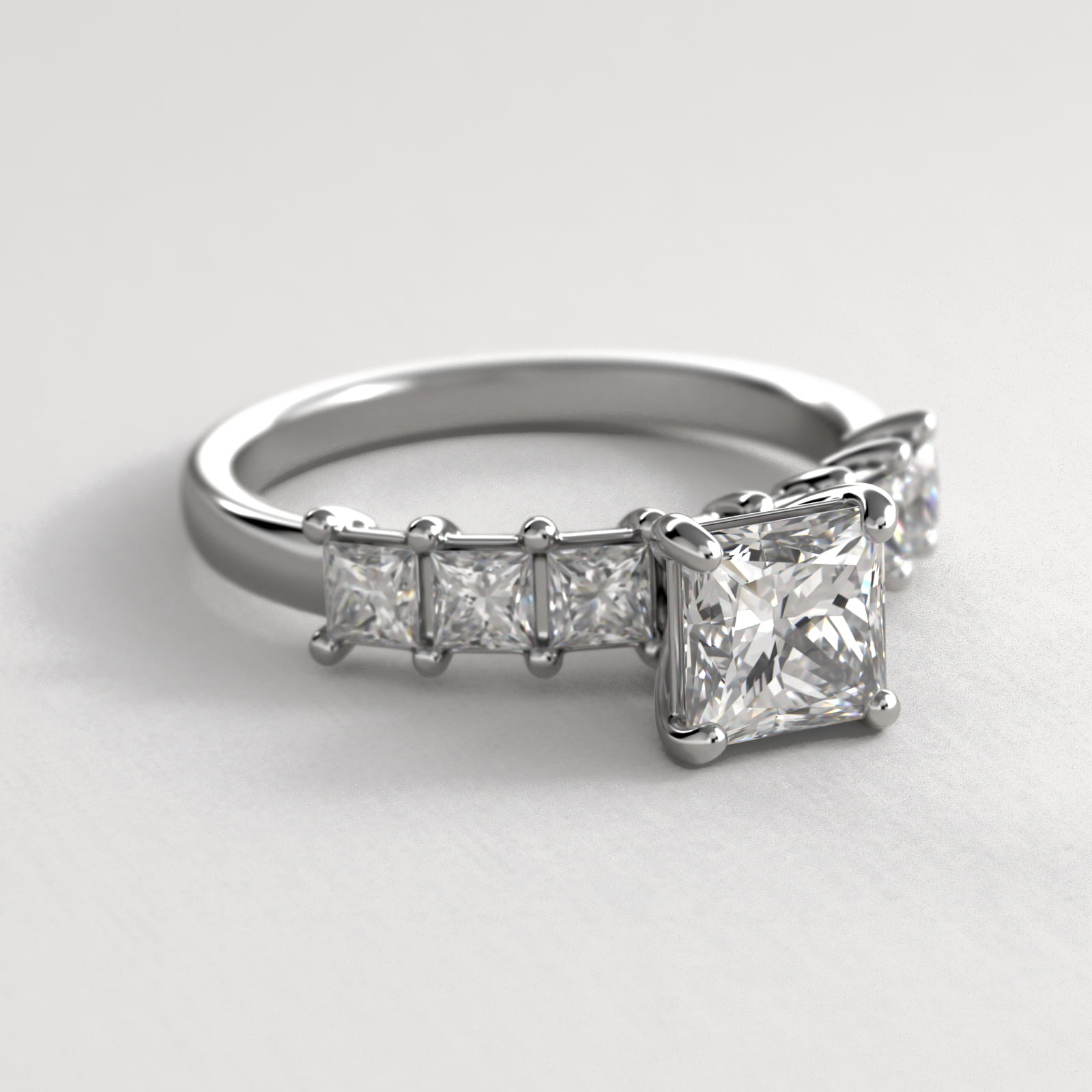 Princess Cut Side Stone Diamond Engagement Ring In Platinum