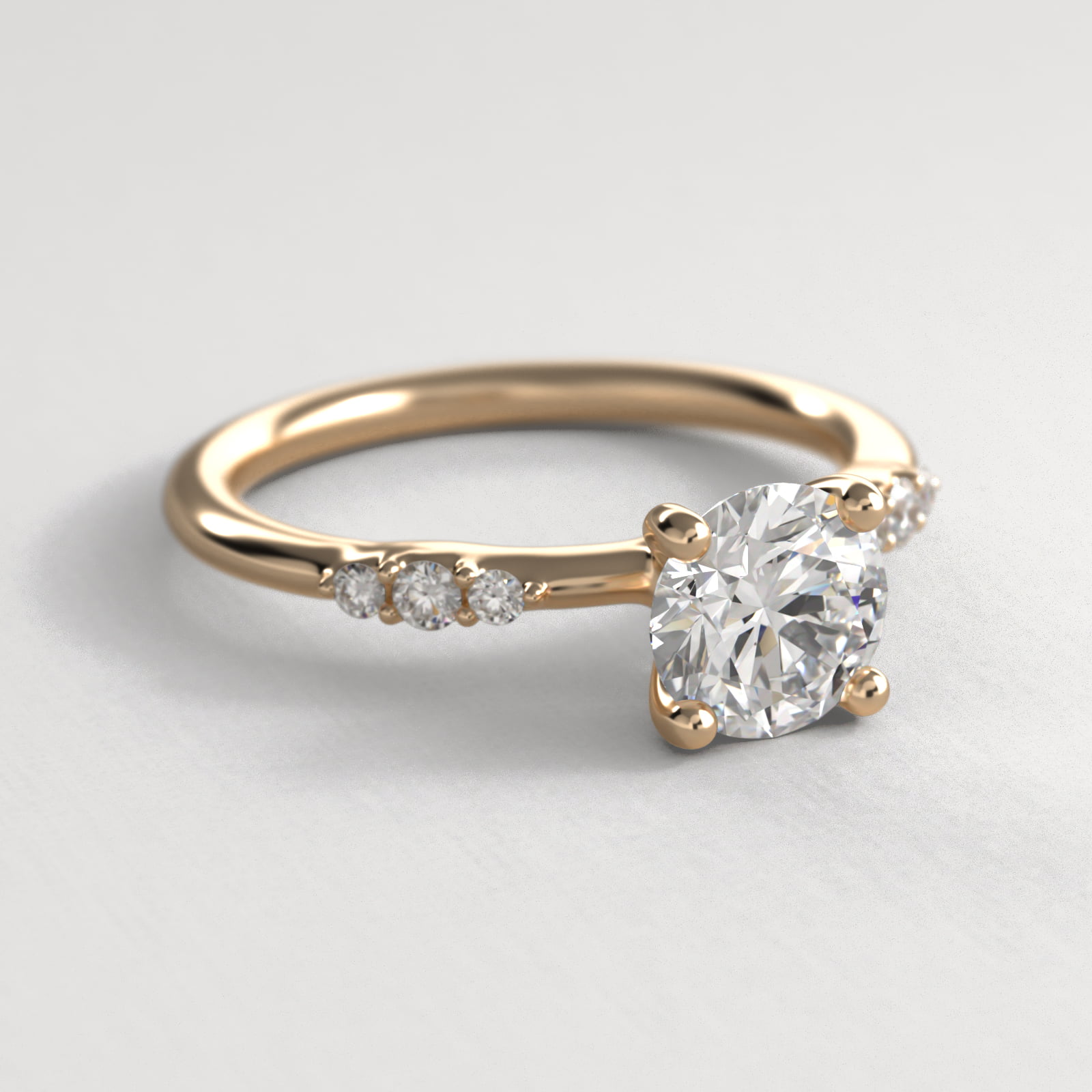 Petite Three Round Diamond Accents Side Stone Engagement Ring In 18K Yellow Gold