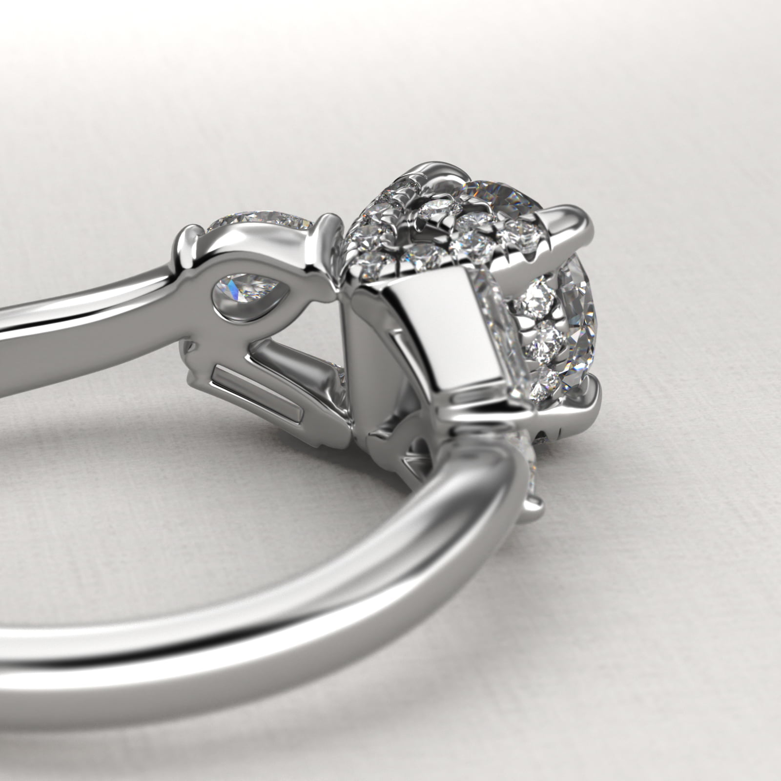 Baguette And Pear Shape Side Stone Diamond Engagement Ring With Hidden Halo In Platinum