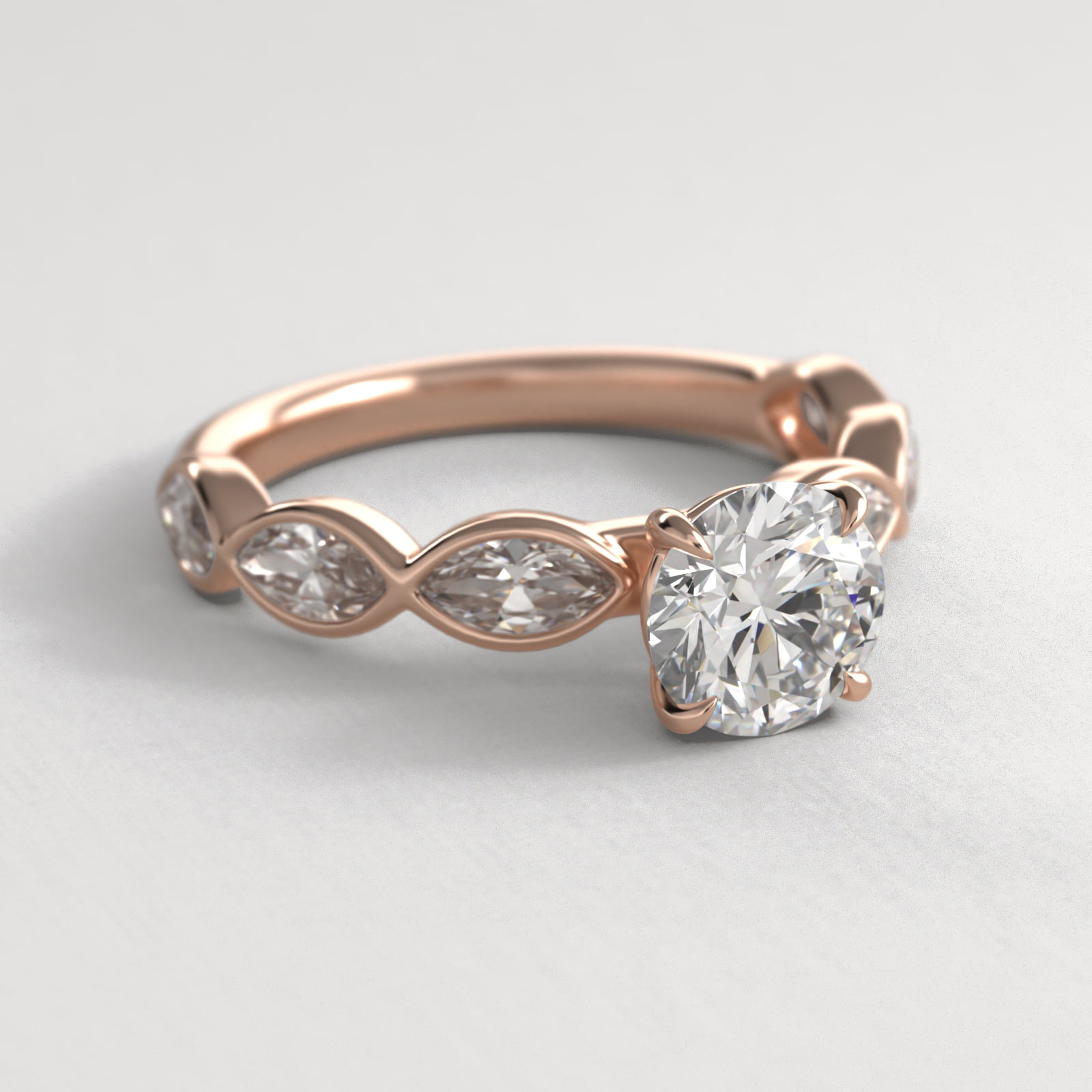 Bezel Set Marquise Cut Side Stone Diamond Engagement Ring In 14K Rose Gold