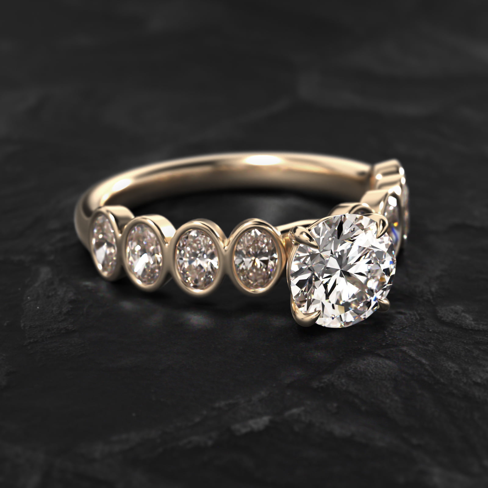 Bezel Set Oval Cut Side Stone Diamond Engagement Ring In 14K Yellow Gold