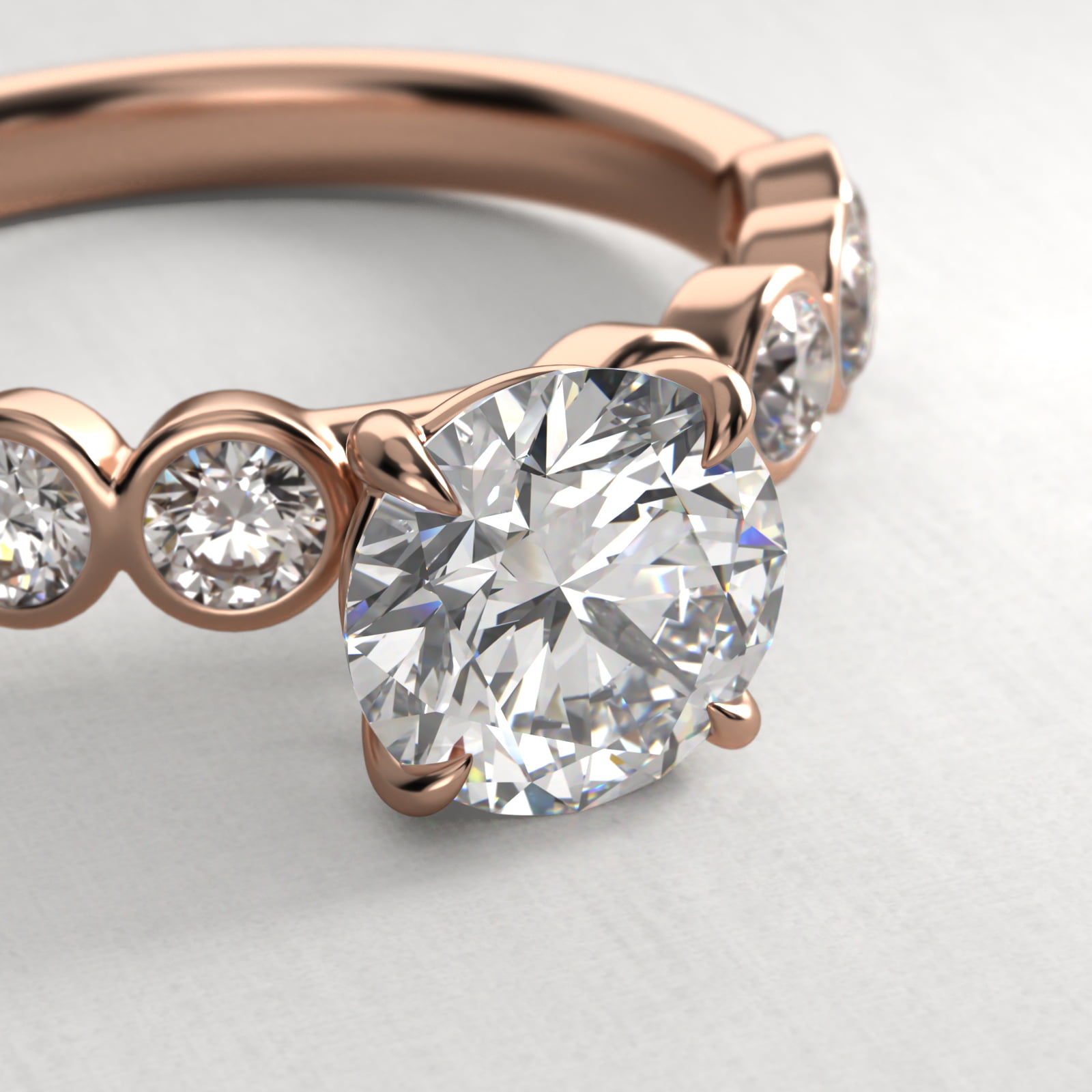 Bezel Set Round Side Stone Diamond Engagement Ring In 14K Rose Gold