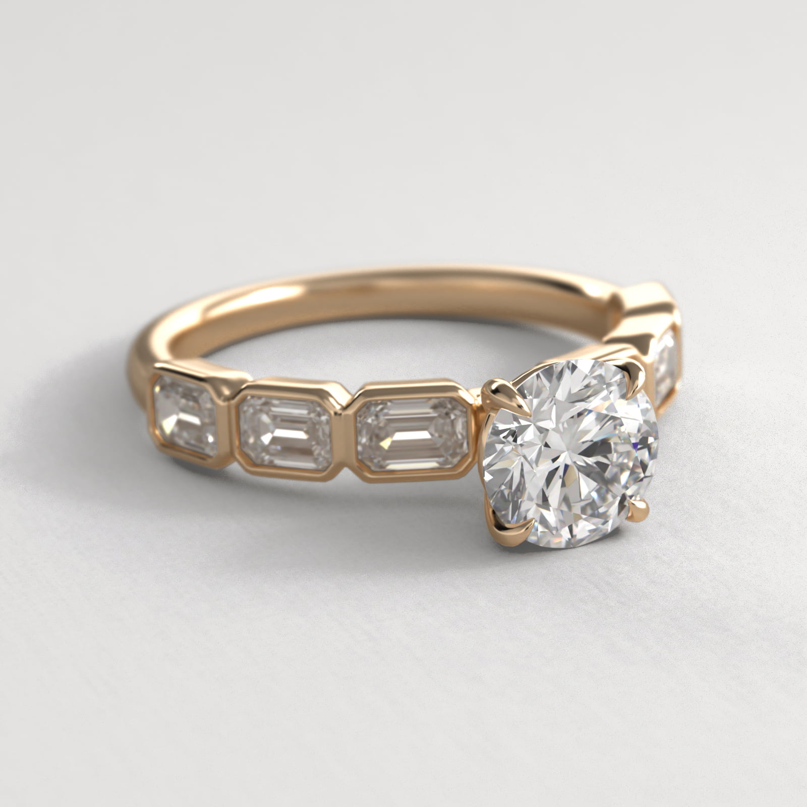 Bezel Set Emerald Cut Side Stone Diamond Engagement Ring In 18K Yellow Gold