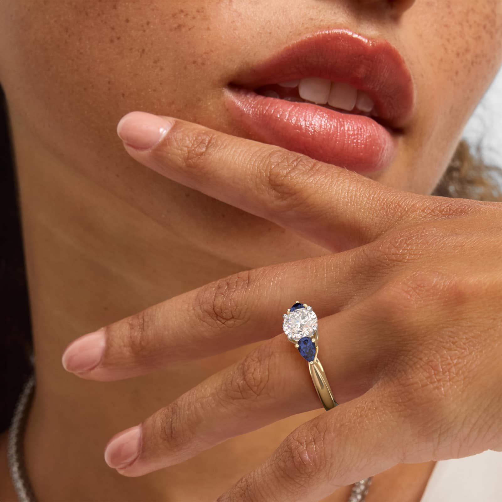 Pear Shaped Blue Sapphire Three Stone Engagement Ring In 18K Yellow Gold