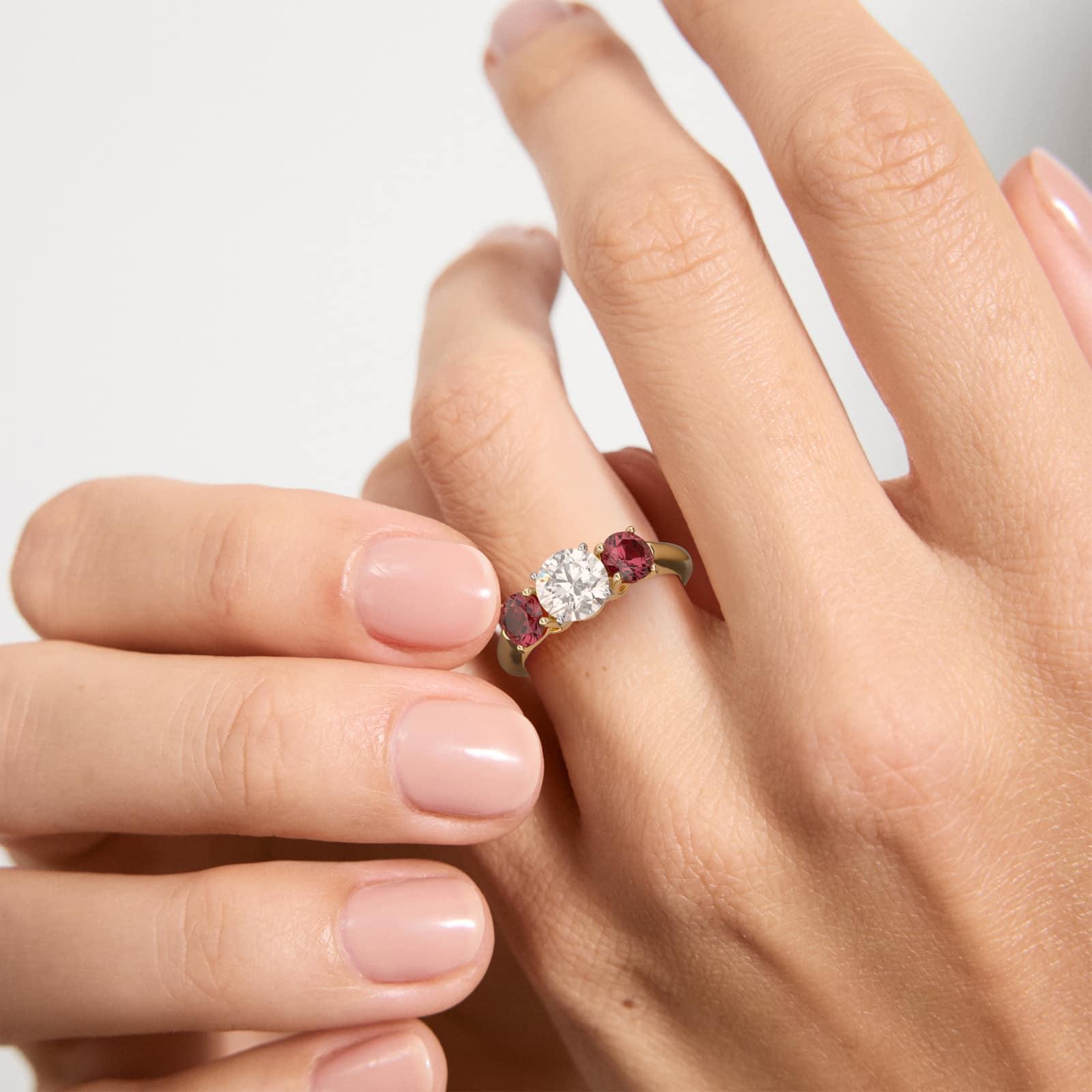 Round Ruby Three Stone Engagement Ring In 14K Yellow Gold