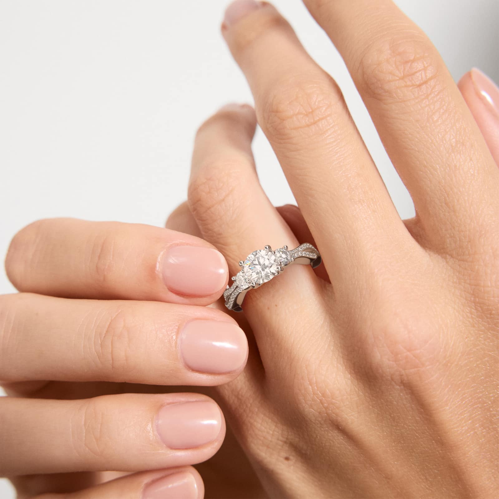 14K White Gold Three Stone Diamond Infinity Engagement Ring