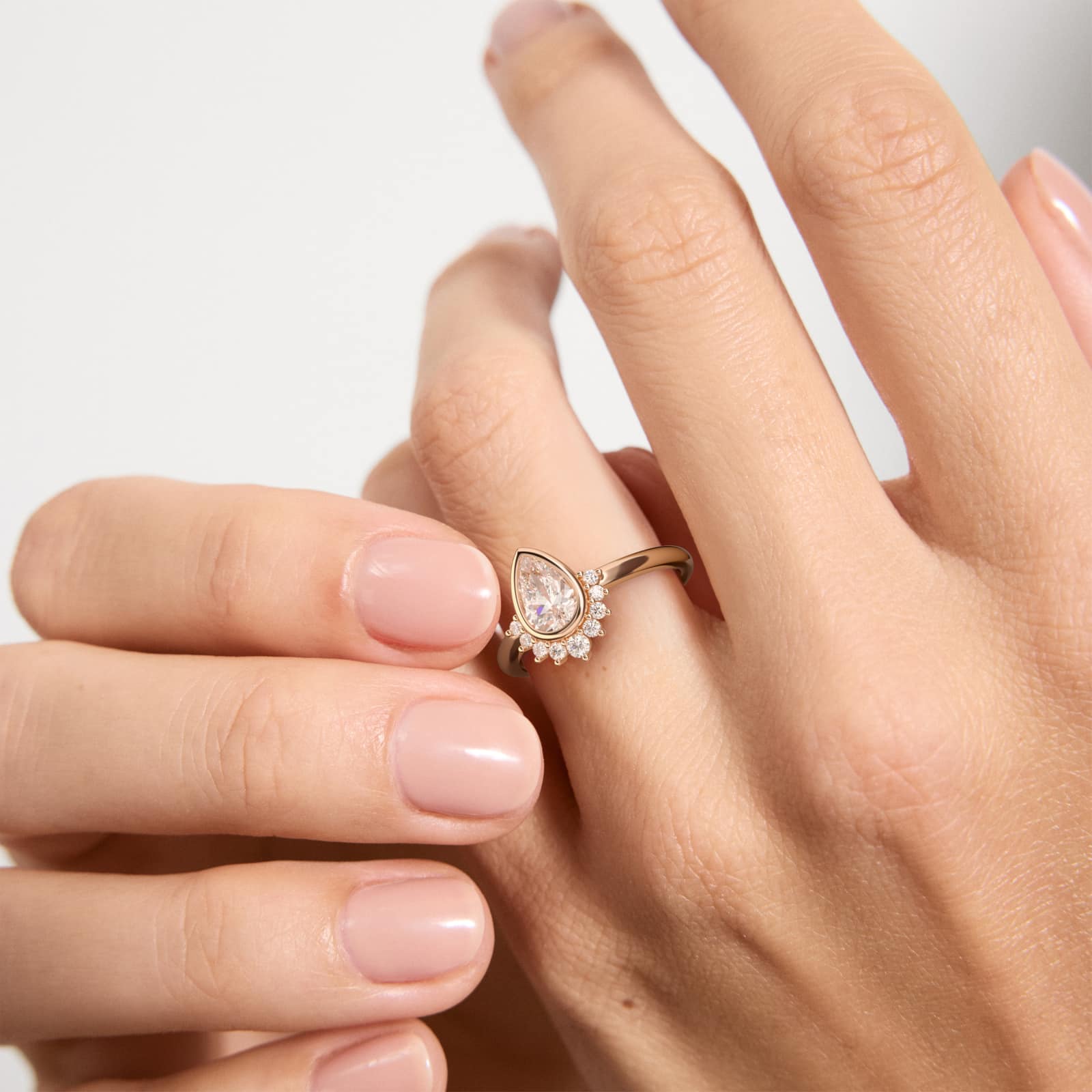 Pear Shape Bezel Set Diamond Tiara Engagement Ring In 14K Rose Gold