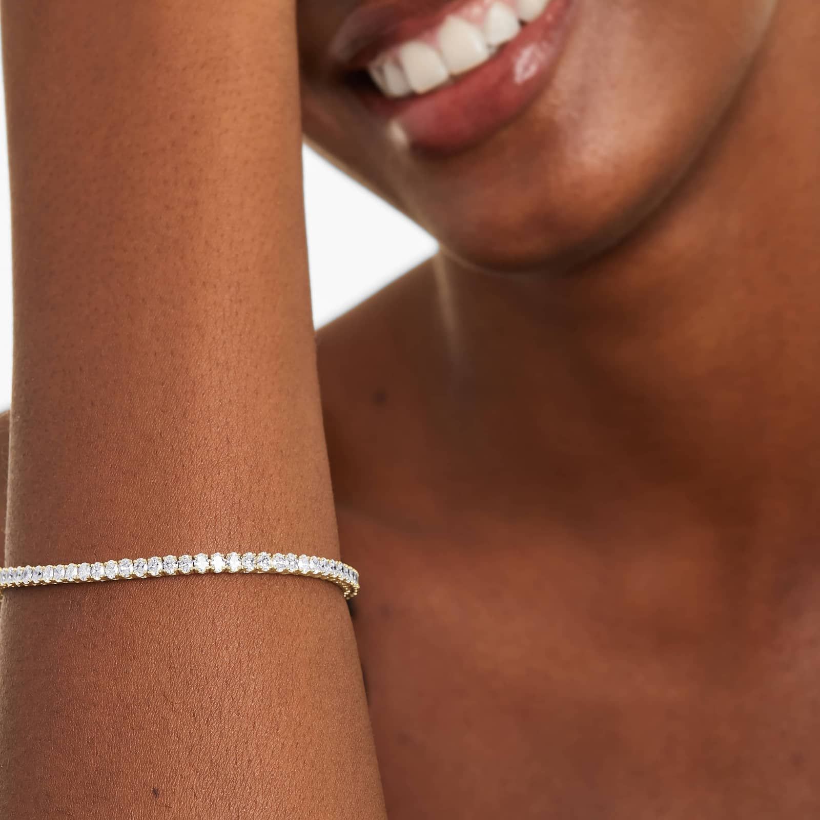 Tennis Bracelet With 5 CTW Oval Cut Lab-Grown Diamonds In 14K Yellow Gold