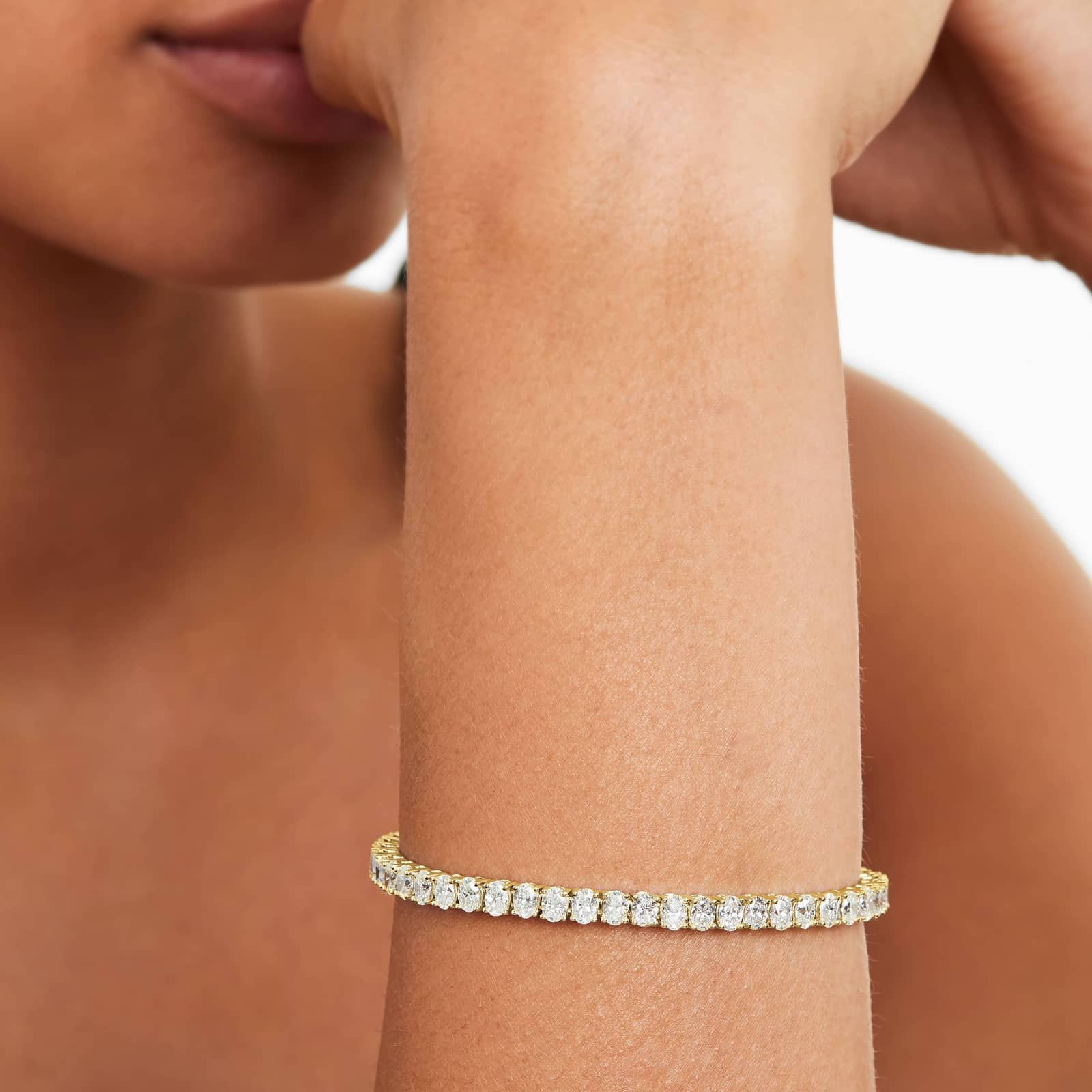 Tennis Bracelet With 10 CTW Oval Cut Lab-Grown Diamonds In 14K Yellow Gold