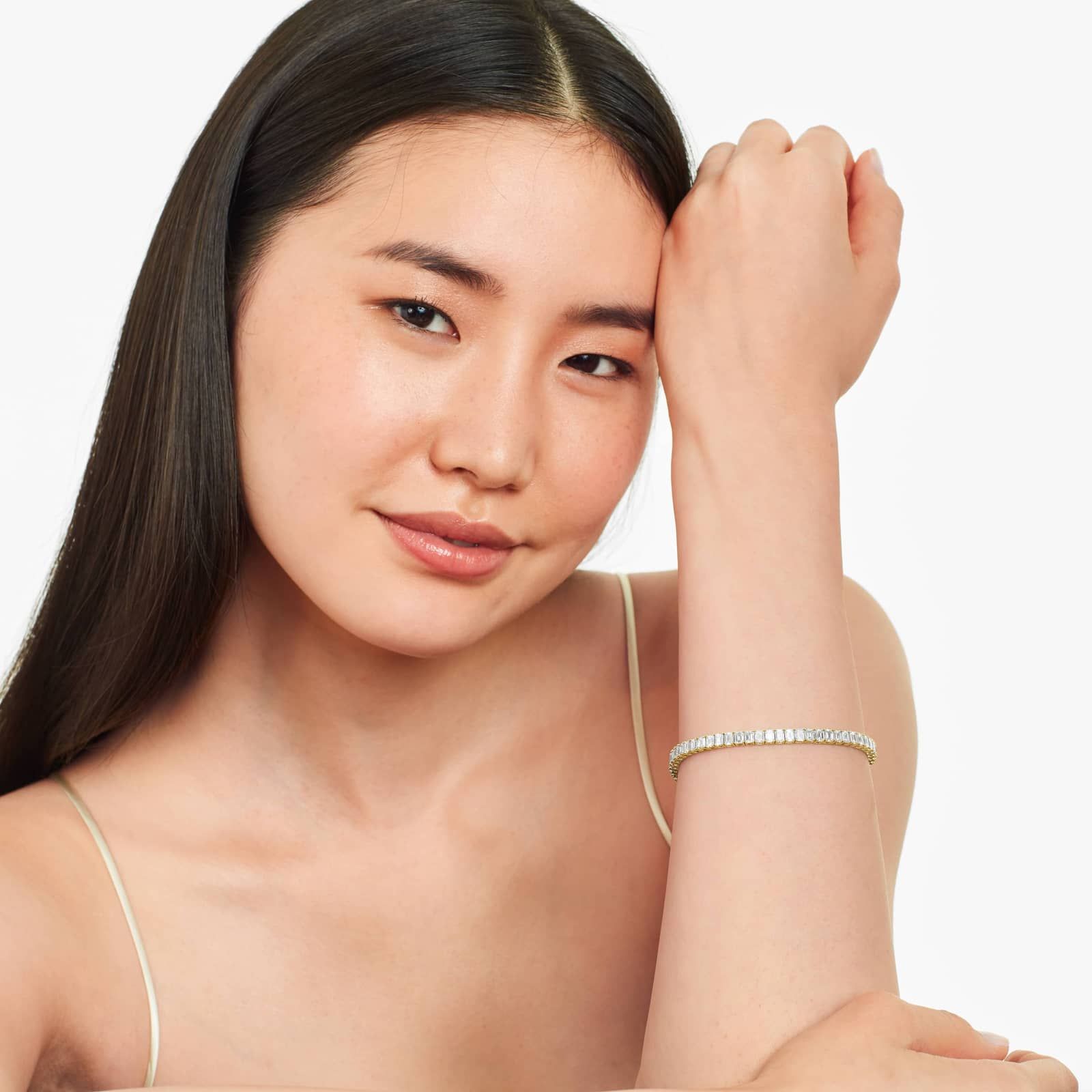 Tennis Bracelet With 10 CTW Emerald Cut Diamonds In 14K Yellow Gold (7")