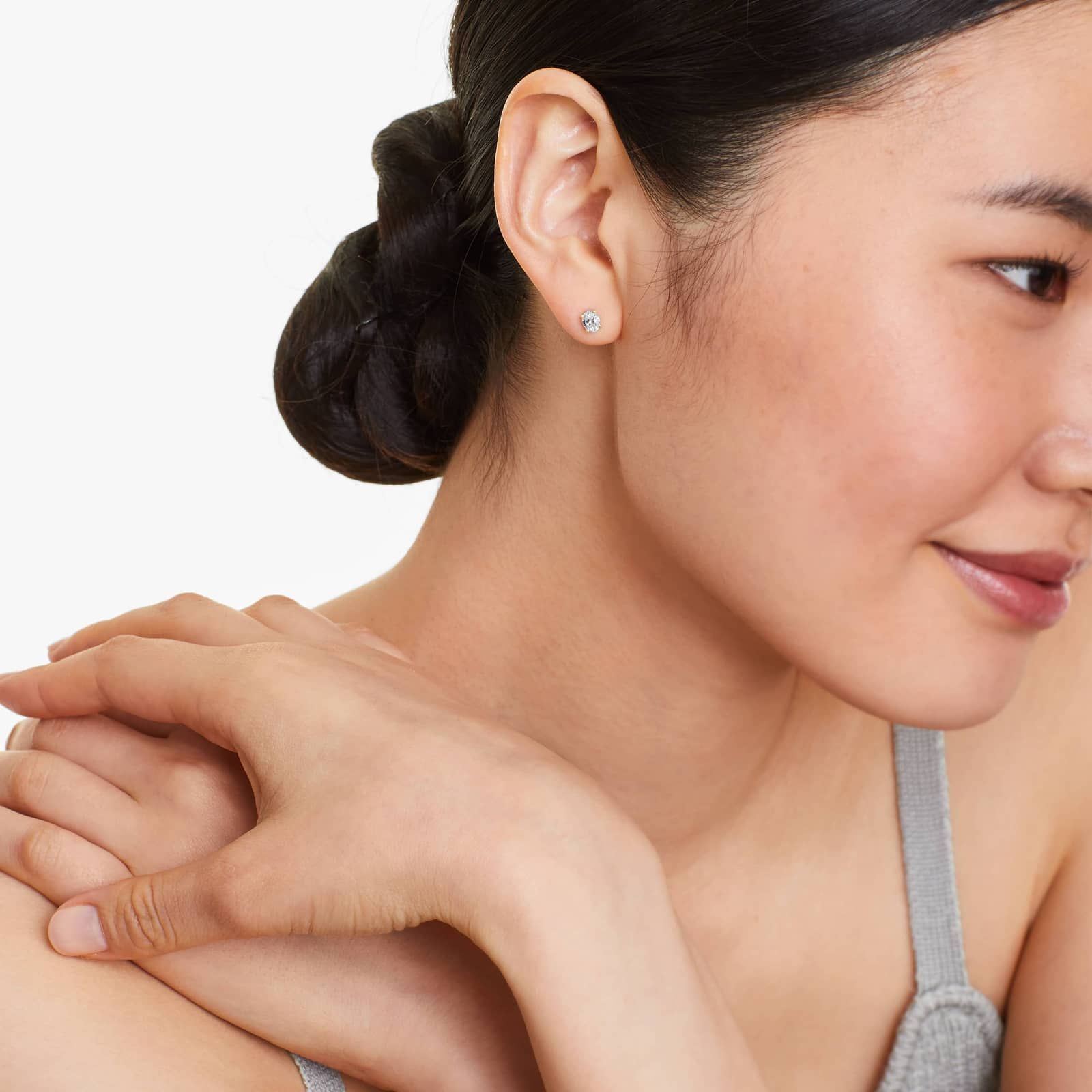 Oval Cut 0.5 CTW Diamond Stud Earrings In 14K Yellow Gold