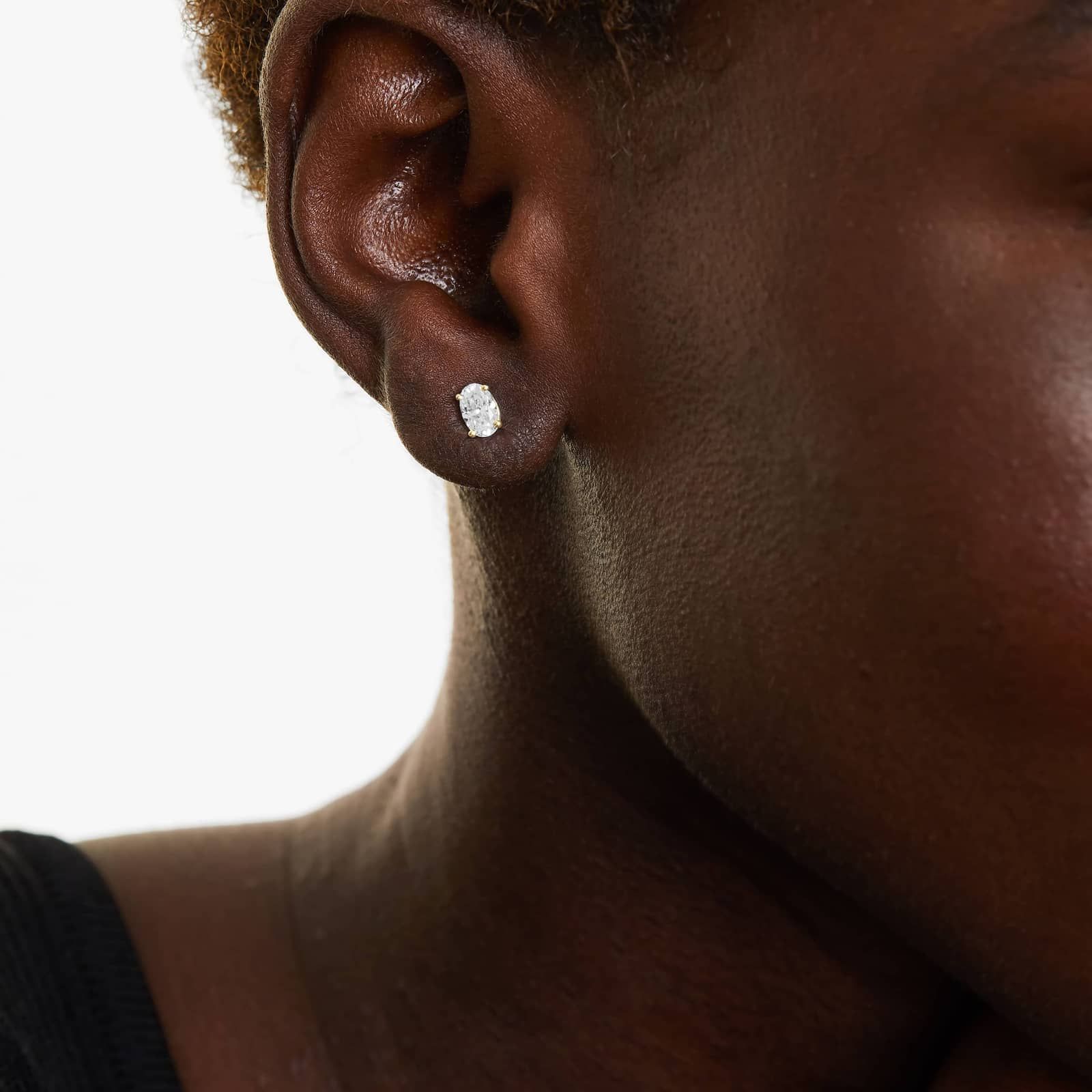 Oval Cut 0.75 CTW Diamond Stud Earrings In 14K Yellow Gold