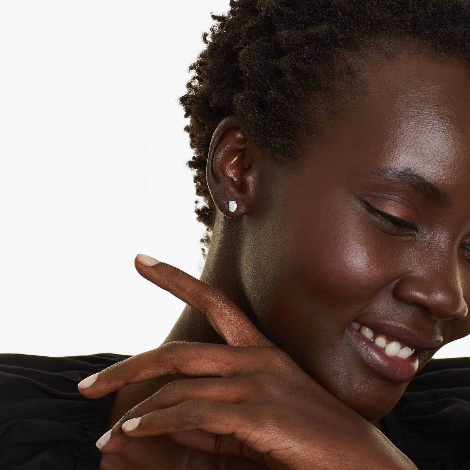 Oval Cut 1 CTW Diamond Stud Earrings In 14K Yellow Gold