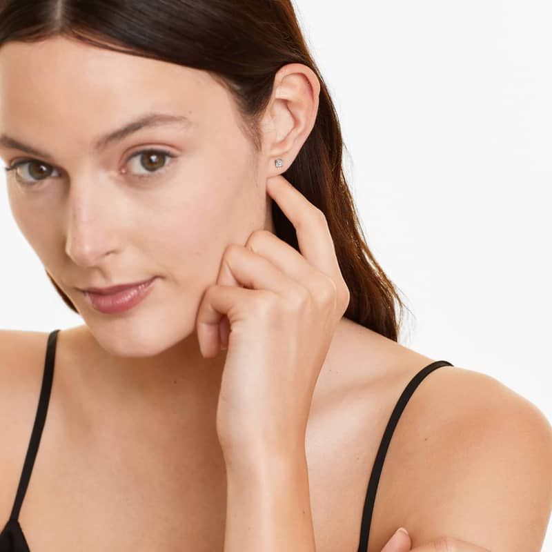 Cushion Cut 0.5 CTW Diamond Stud Earrings Is In Platinum