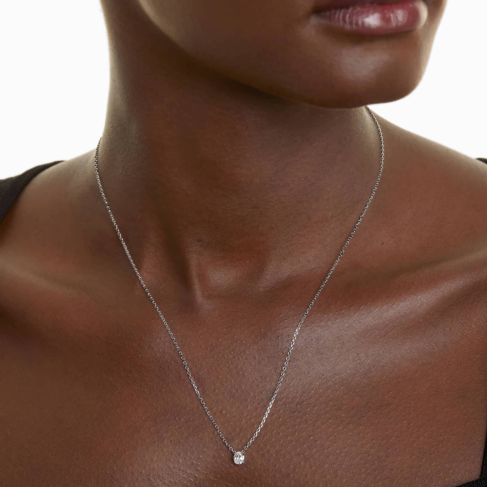 Platinum Oval Shape Diamond Solitaire Pendant (0.25 CTW - H-I / SI1-SI2)